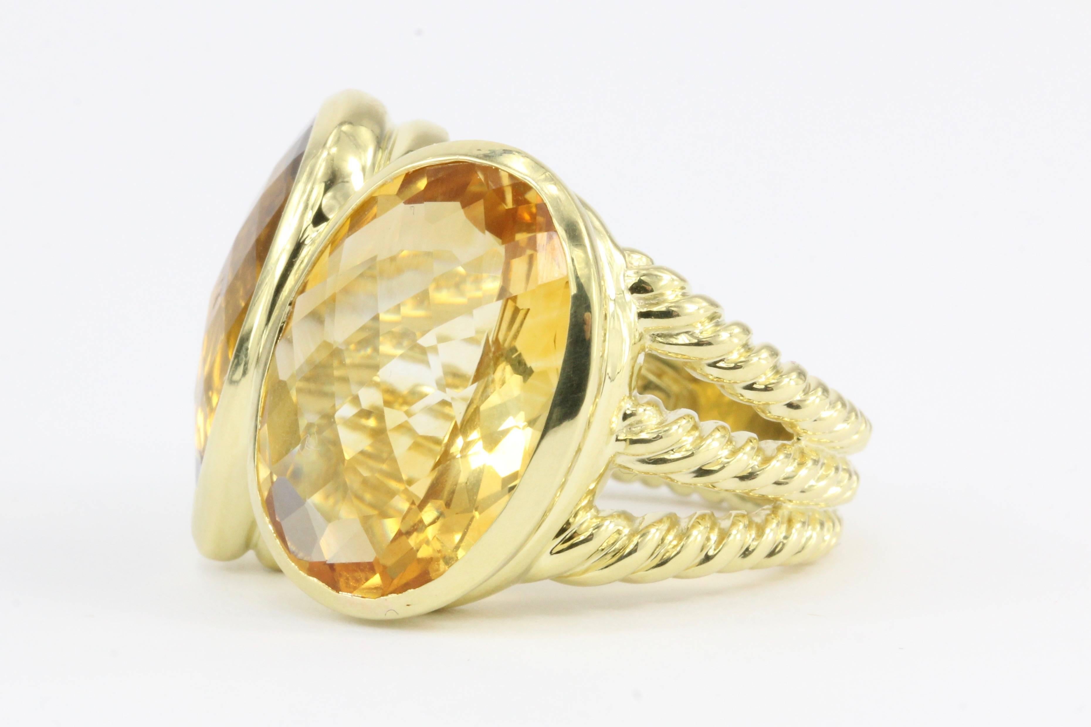 Era: Modern

Hallmark: 750

Makers Mark: D.Y.

Composition: 18K Yellow Gold 

Designer: David Yurman 

Primary Stone: Citrine

Stone Weight: .48 CTW (48 x .01)

Ring Width: 5.8mm - 19.4mm

Ring Size: 7

Ring Weight: 17.3 grams 

Condition: Excellent