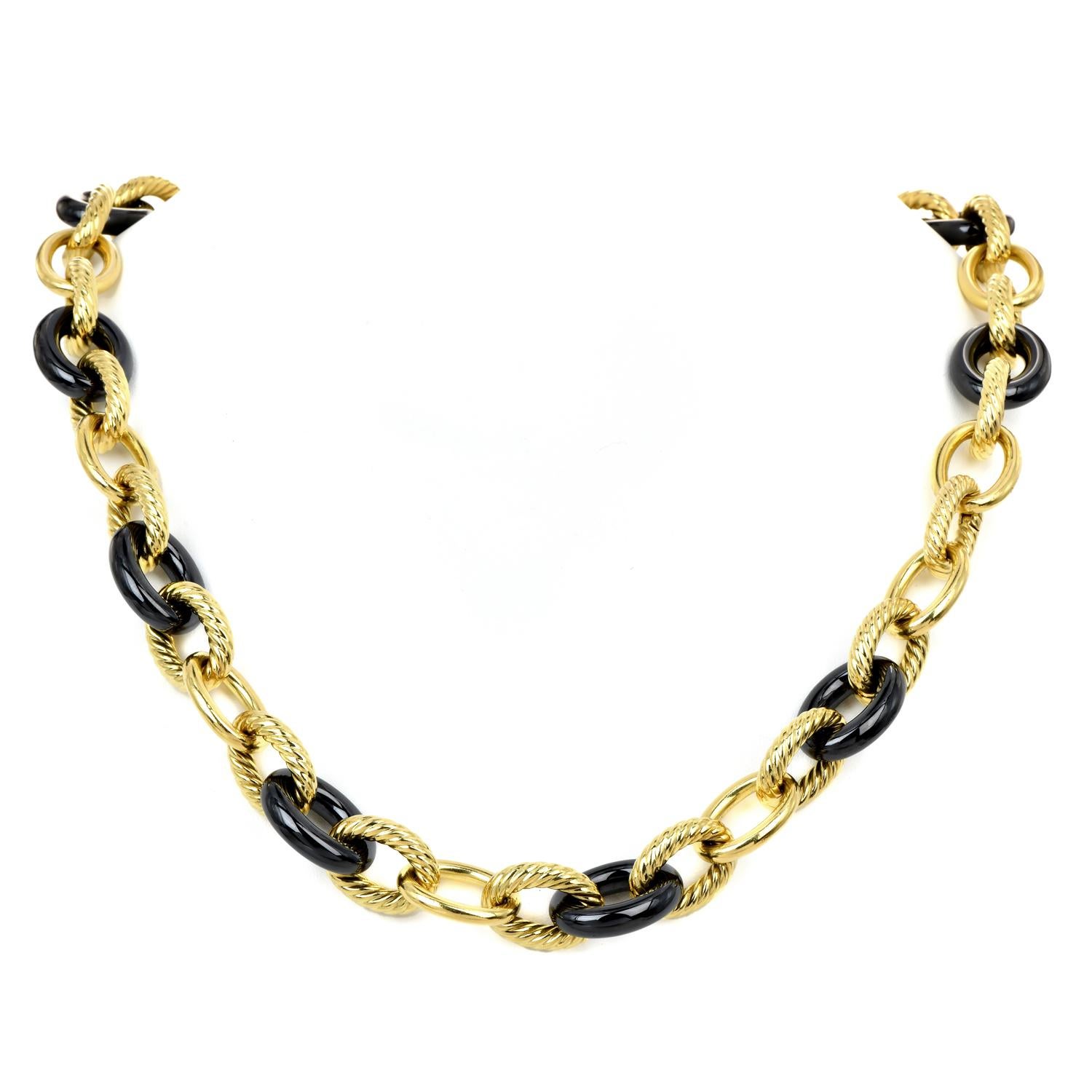A bold luxurious David Yurman Piece, perfect for unisex wear.

With interpolated, hematite links, polished gold links, and rope design links.

This necklace is made in 18K yellow gold. Secured by a discrete hinged clasp.

Each hematite Link