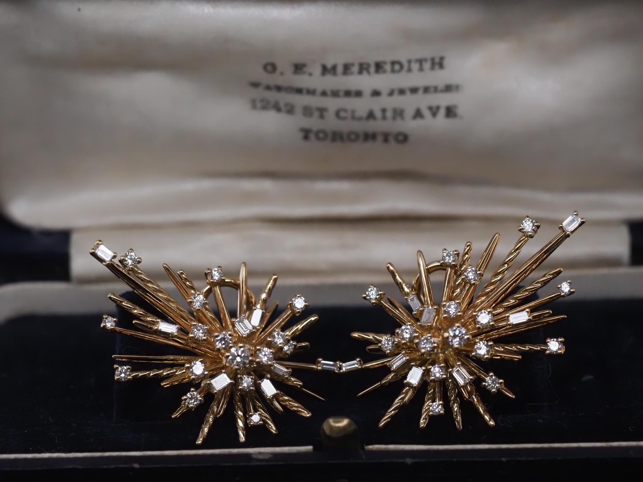 Year: 2000s

Item Details:
Metal Type: 18K Yellow Gold [Hallmarked, and Tested]
Weight: 14.8 grams

Hallmarks: DY 750

Diamond Details:
1.00ct total weight, Round Brilliant and Baguette Diamonds, F Color, VS Clarity.

Measurements: 1.25 inch