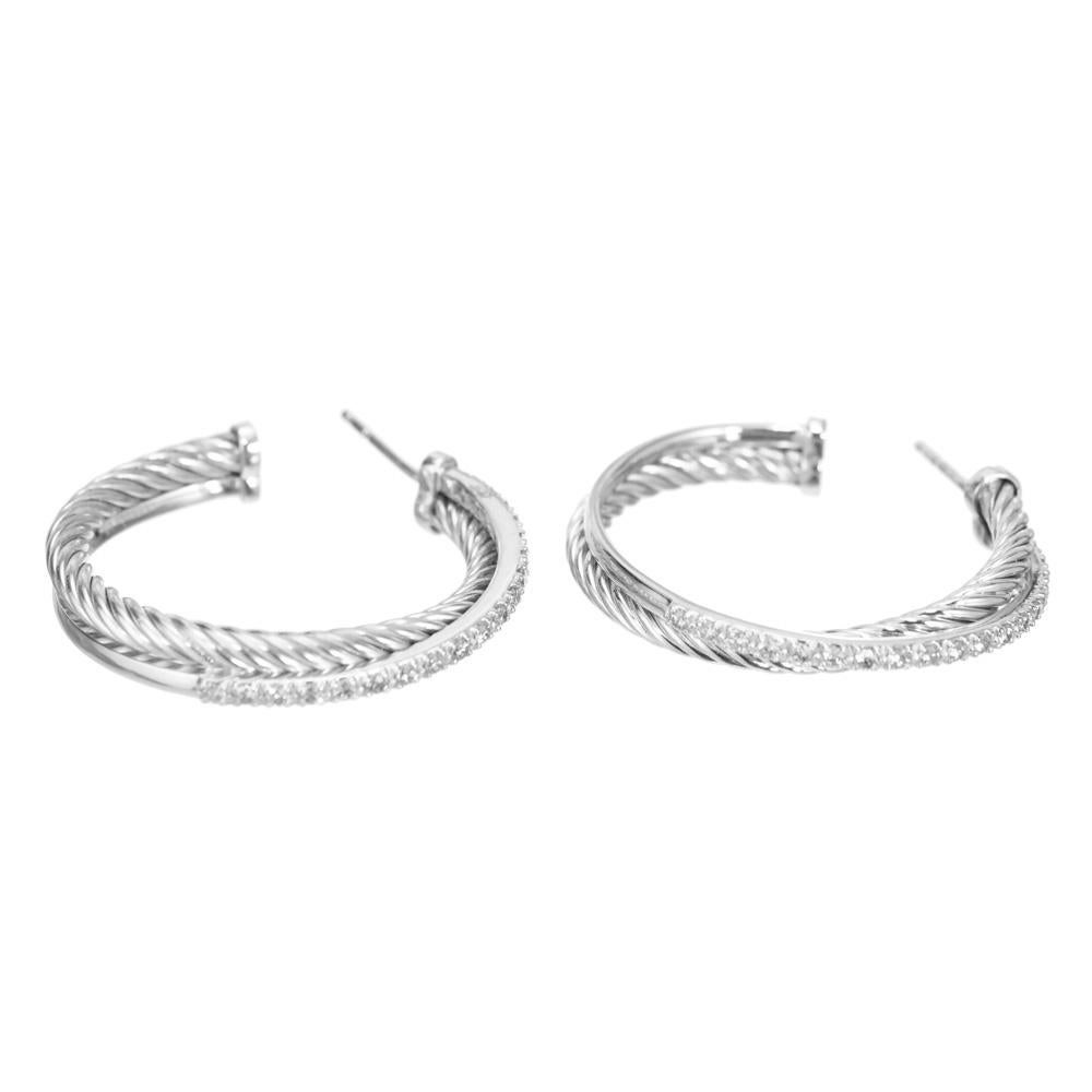 David Yurman sterling silver diamond hoops with crossover cable. 38 round brilliant cut diamonds. 

38 round brilliant diamonds, G-H VS approx. .31cts
Sterling silver 
14k white gold 
Stamped: 585 925
Hallmark: DY
11.6 grams 
Top to bottom: 32.4mm