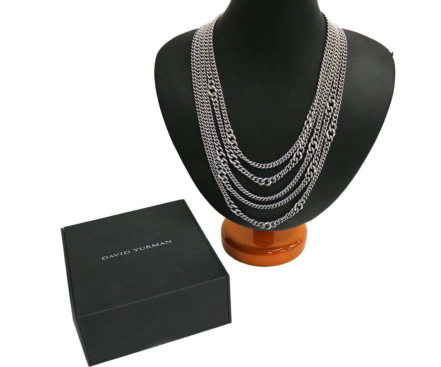 David Yurman 5 Row Drape Curb Chain Necklace W/Box OG Tag

David Yurman 5 Row Drape Curb Chain Necklace
.925 Sterling Silver
Necklace Length: 19.75-21.25 Inches (Adjustable)
Necklace Weight: 182.40 Grams
David Yurman Box And Original Tag
Stamped: