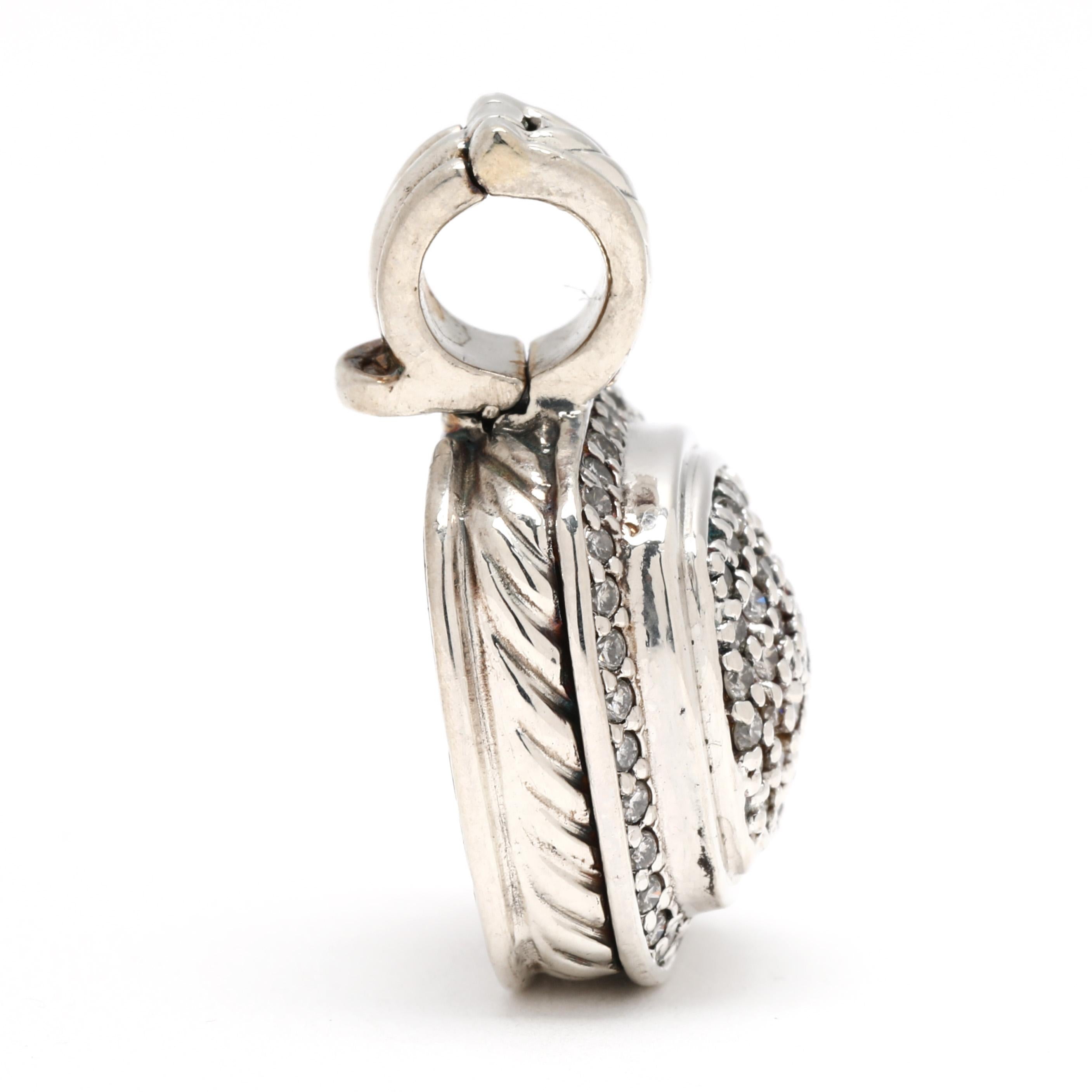 Stones:
diamonds
round brilliant cut
1.25 mm
approximately .50 total carats
GH color/ SI1-2 clarity

Length: 24 mm

Width: 16 mm

Weight: 4.2 dwts. / 6.6 grams

Stamps: 