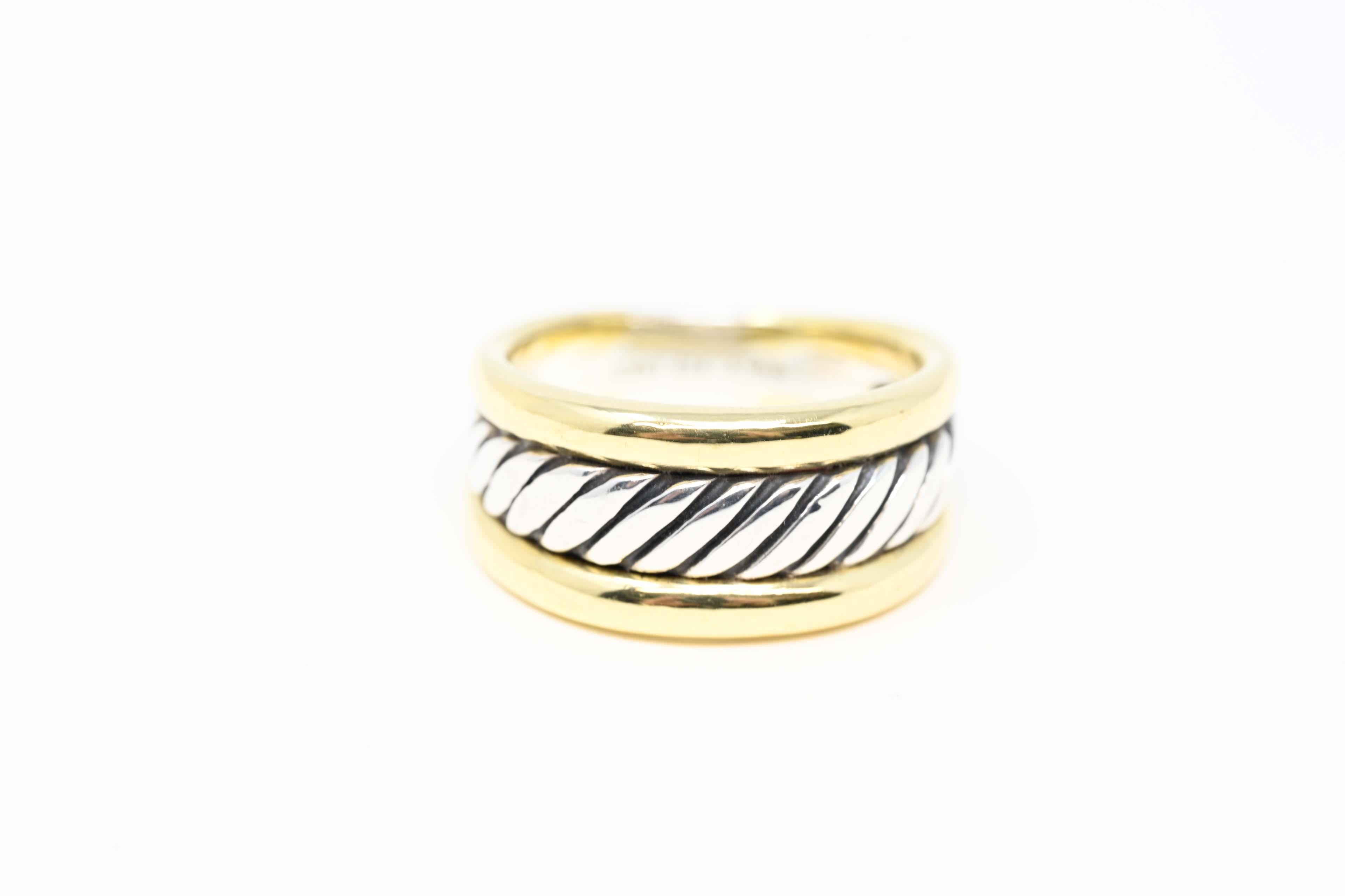 David Yurman 925 silver & 18k yellow gold thoroughbred ring. The ring is a size 6.5 and stamped on the inside 
