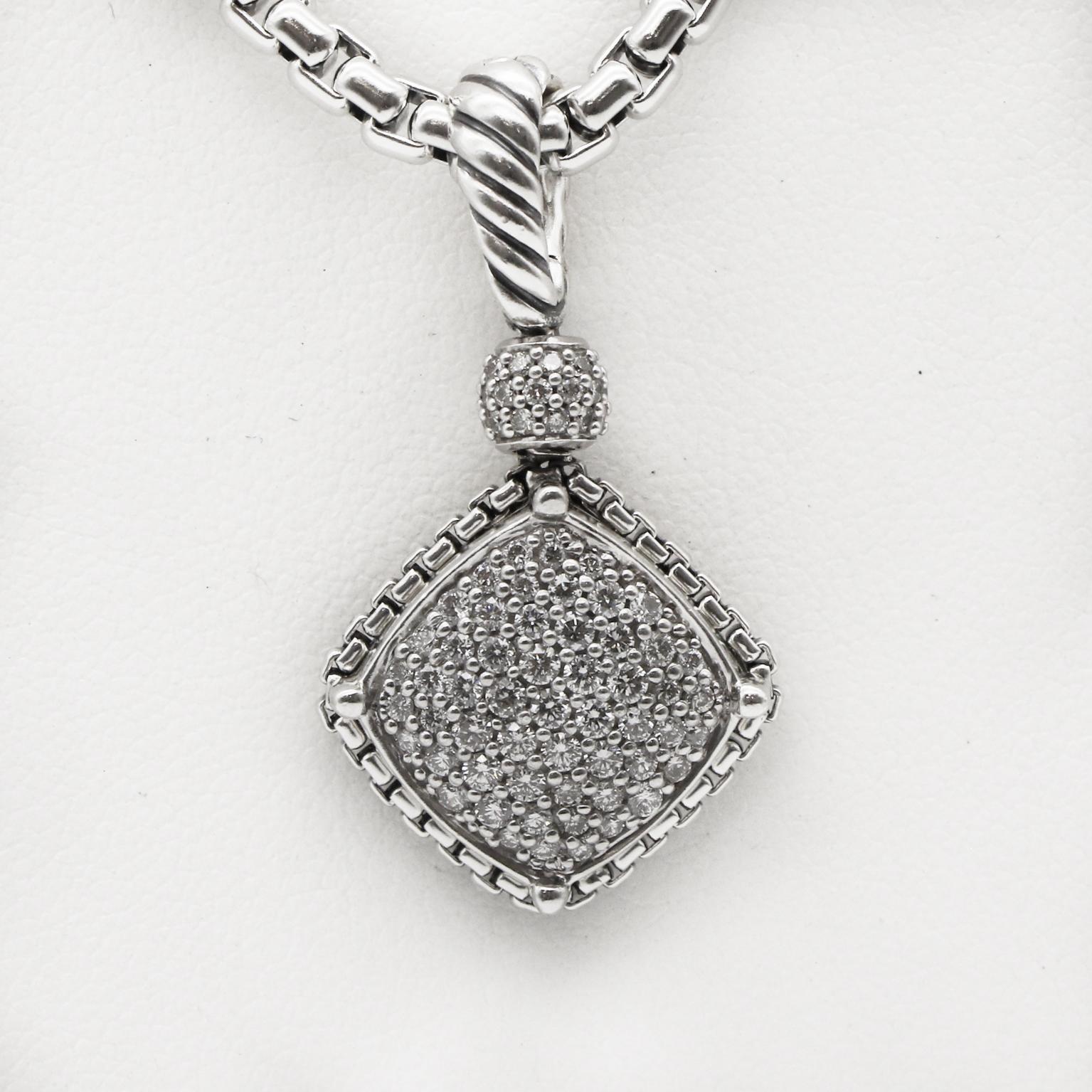 DAVID YURMAN 
On Point Collection 
925 Sterling Silver 
Diamond encrusted Cushion Pendant
and Box Chain 
This charming necklace pendant features a cable bale in sterling silver that holds multiple faceted diamonds
that are surrounded in a silver