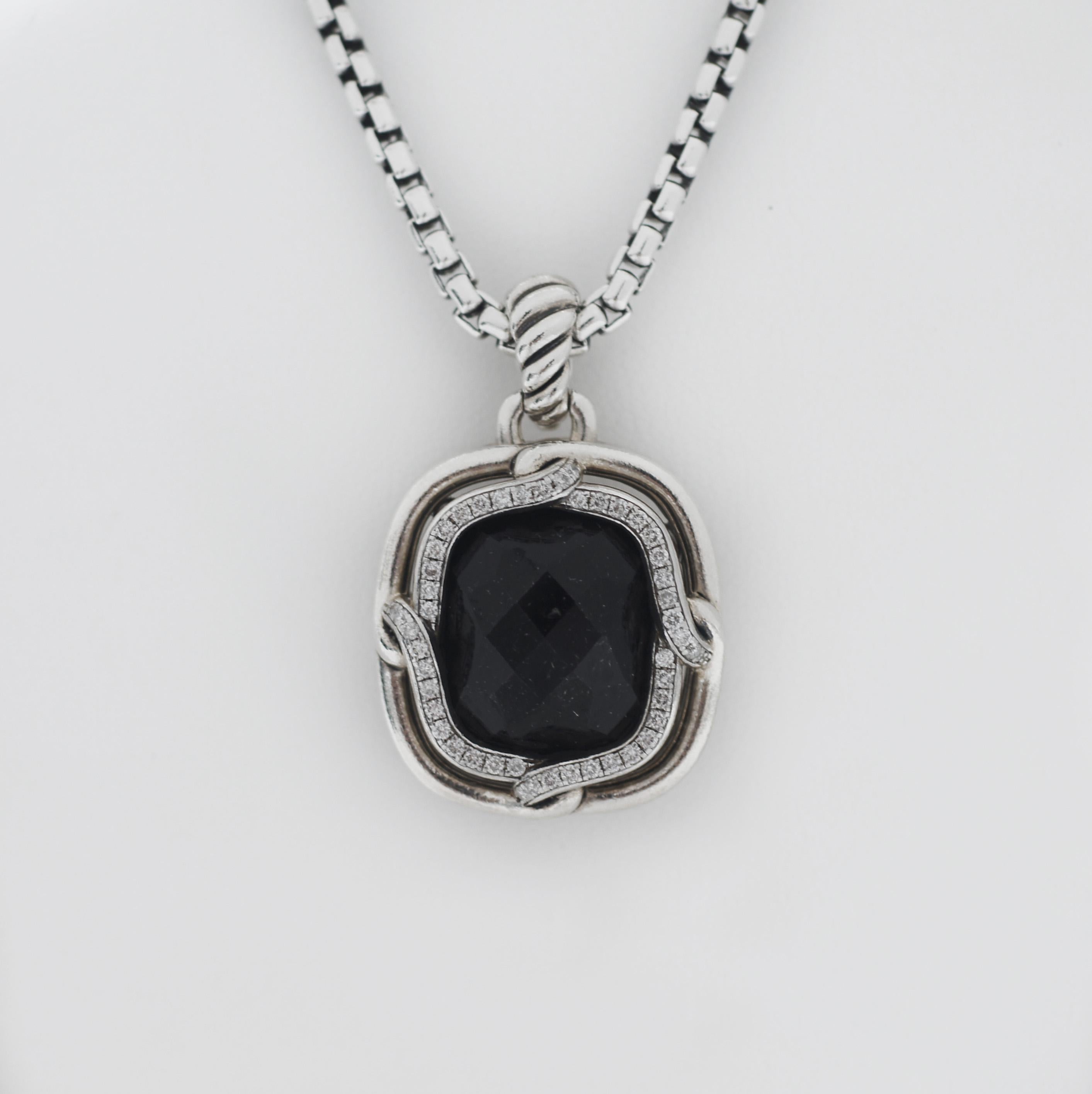 David Yurman
Labyrinth Collection
Material: 925 sterling silver
Main Stone: Onyx
Diamonds: 48 round brilliant cuts Approx. 0.72 carat total weight surrounding Onyx
Pendant measures 1 1/4 inches long and 1 inches wide
Chain measures 18 inches
