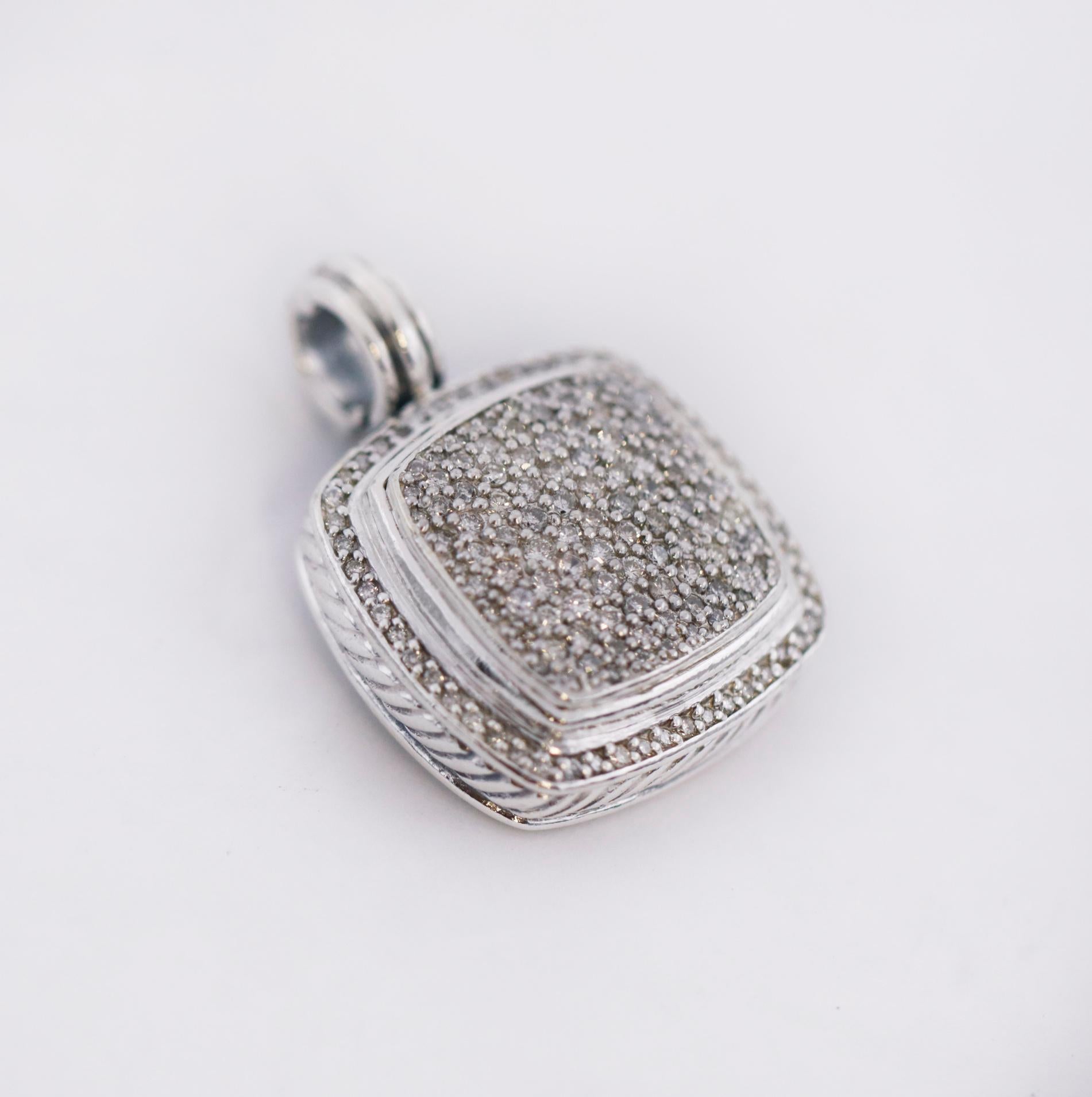 David Yurman

Albion Pendant

Polished 925 sterling silver

Diamonds

Accented by 19mm x 19mm pave Diamond cushion with bezel diamonds

26mm Pendant

Approx. 18 grams

Hallmarked: (C)DY 925 - 925 1/4 750

This beautiful pre-loved David Yurman is in