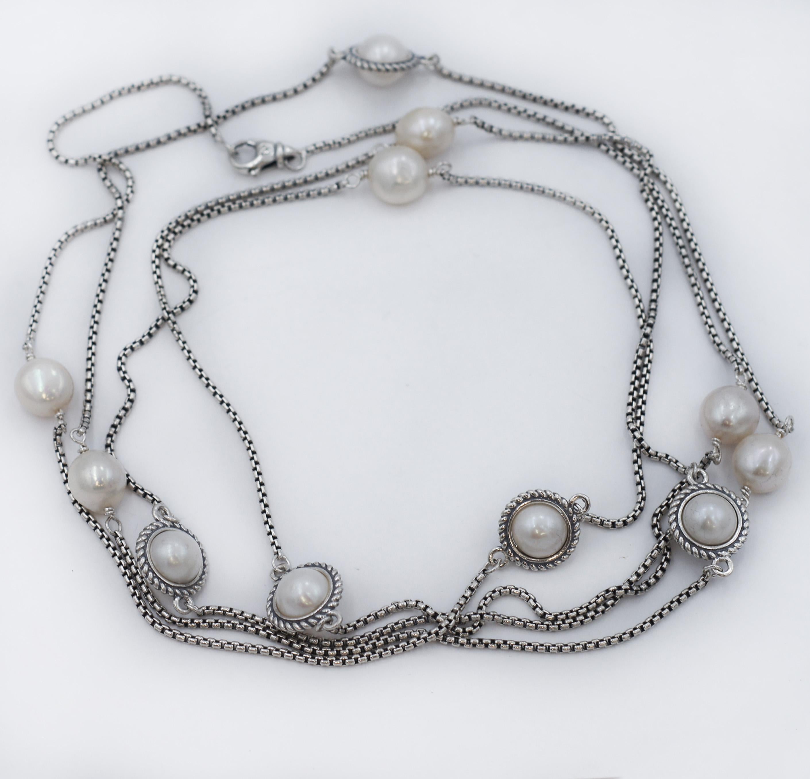 DAVID YURMAN
Pearl Station necklace
Details:
David Yurman
925 Sterling Silver
11 Pearls spaced neatly throughout this long Necklace
Bezel Cable Design around 5 of the pearls
58” Long chain
Chain is a 1.75mm puffed box chain
David Yurman chains are