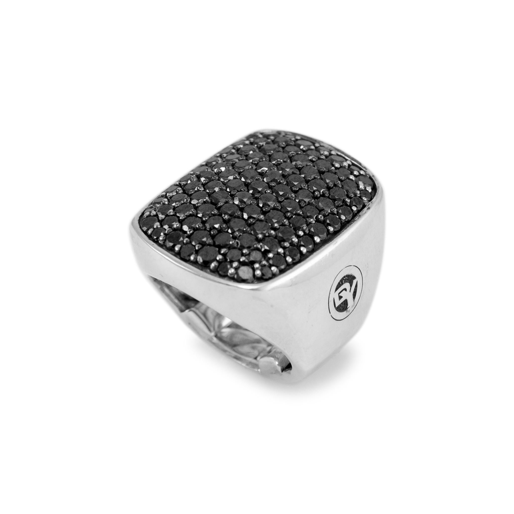 Brand: David Yurman

Gender: Ladies

Metal Type: 925 Sterling Silver

Ring Size: 2.00

Width: 24.30 mm tapering to 6.10 mm

Weight: 26.42 grams

Silver diamond cocktail ring with sizing bars, with a tapered comfort-fit shank. The metal was tested