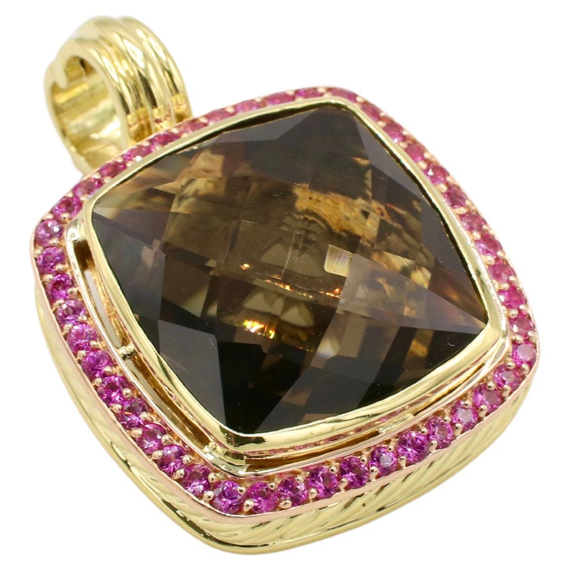 David Yurman Albion 18 Karat Yellow Gold Smoky Quartz & Pink Sapphire Pendant Enhancer 
Metal: 18k yellow gold
Weight: 22.63 grams
Gemstones: Smoky quartz & pink sapphires
Diameter: 26mm
