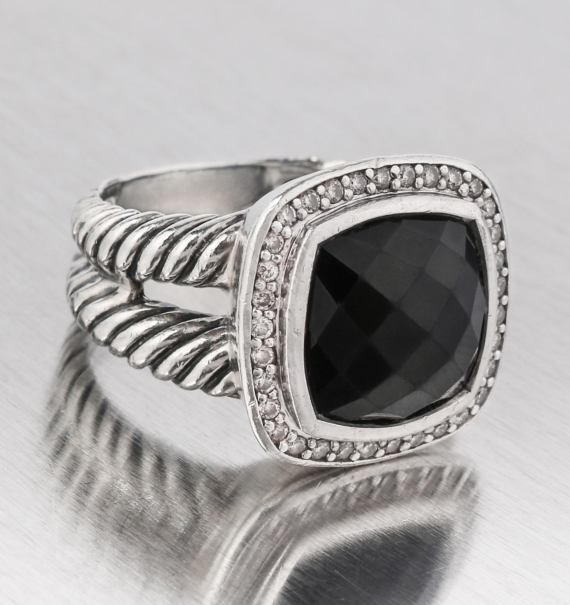 David Yurman Albion Ring. Sterling silver cable split-shank. Checkerboard faceted 11mm black onyx surrounded by bezel set pave diamonds. Marked with signature 