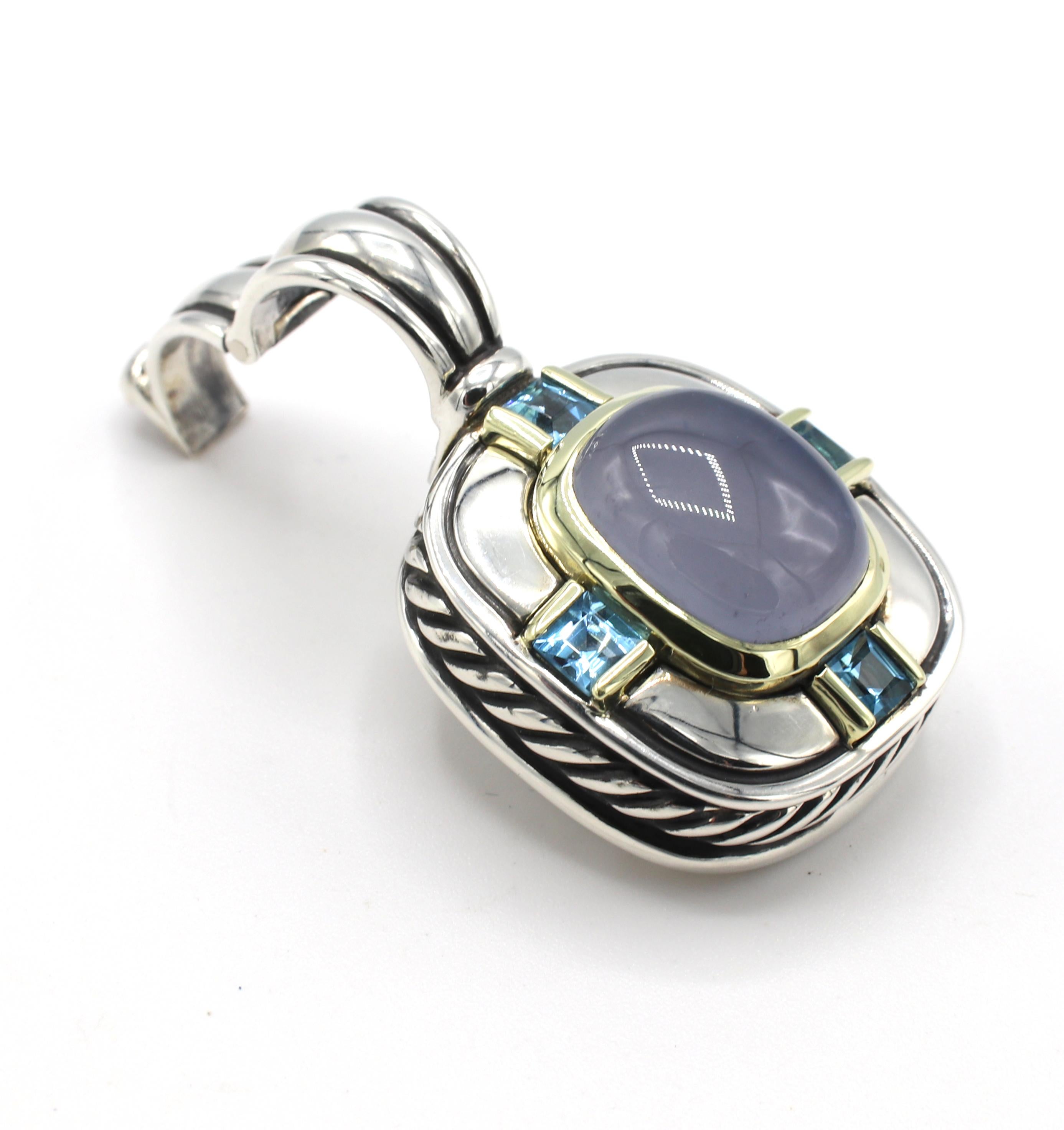 David Yurman Albion Chalcedony & Blue Topaz Silver & Gold Enhancer Pendant
Metal: Sterling silver & 14k yellow gold
Weight: 12.55 grams
Length: 33.5mm
Width: 20mm
Note: Pendant/Enhancer only, does not include chain