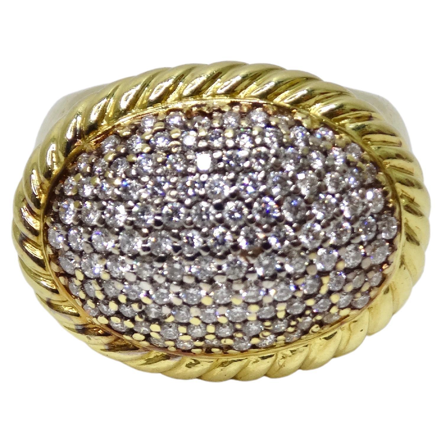 A David Yurman gem! Add this to your collection and you will be reaching for this everyday. It would pair beautifully with your day or night outfits making this a versatile find! It features an oval center completely encrusted in diamonds lined with