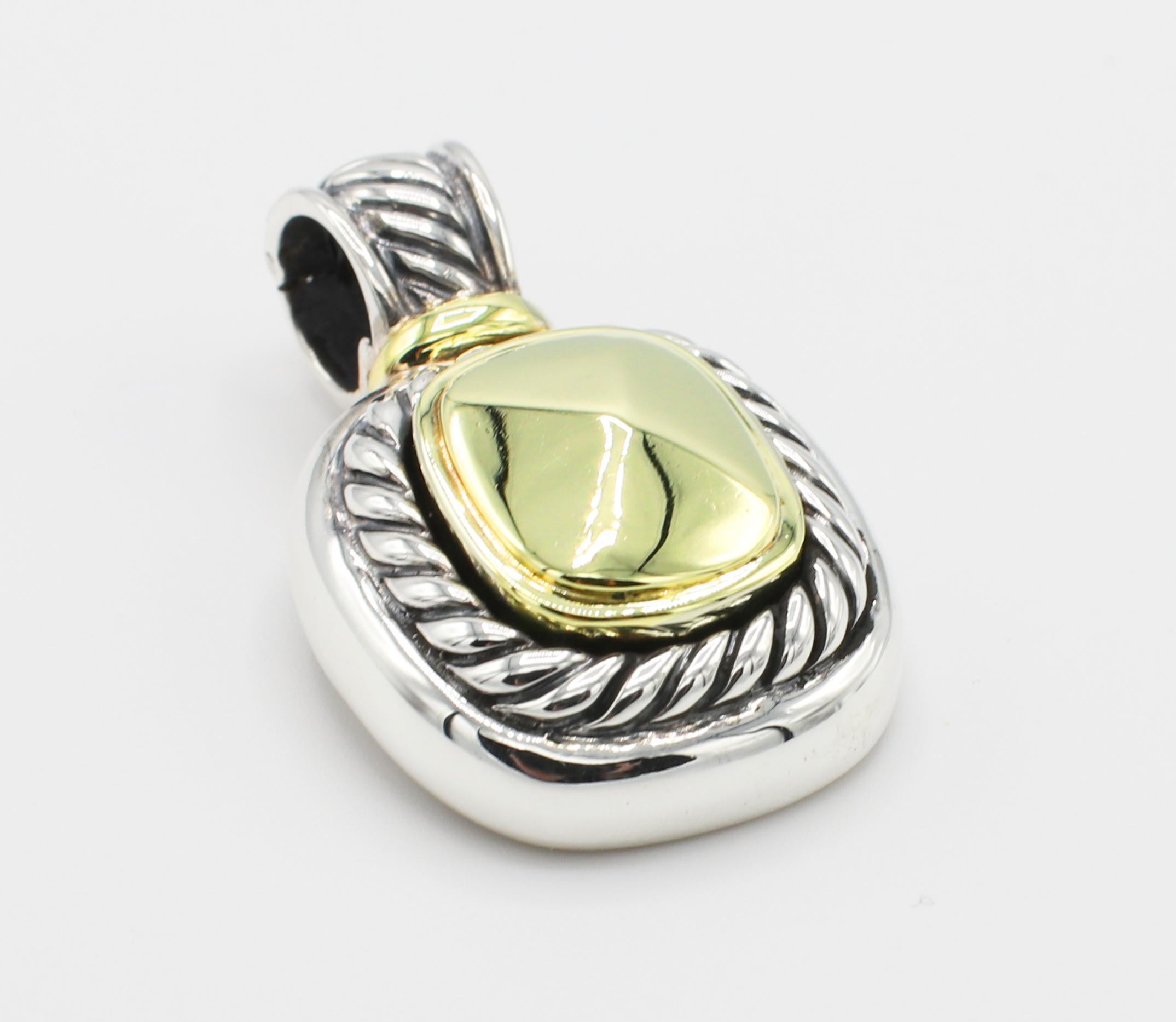 David Yurman Albion Dome Gold & Sterling Silver Pendant Enhancer 
Metal: Sterling silver 925 & 14k yellow gold 585
Weight: 12.47 grams
Length: 31MM (including bale)
Width: 19MM
Signed: D. YURMAN 925 585
*Pendant only, does not include chain 