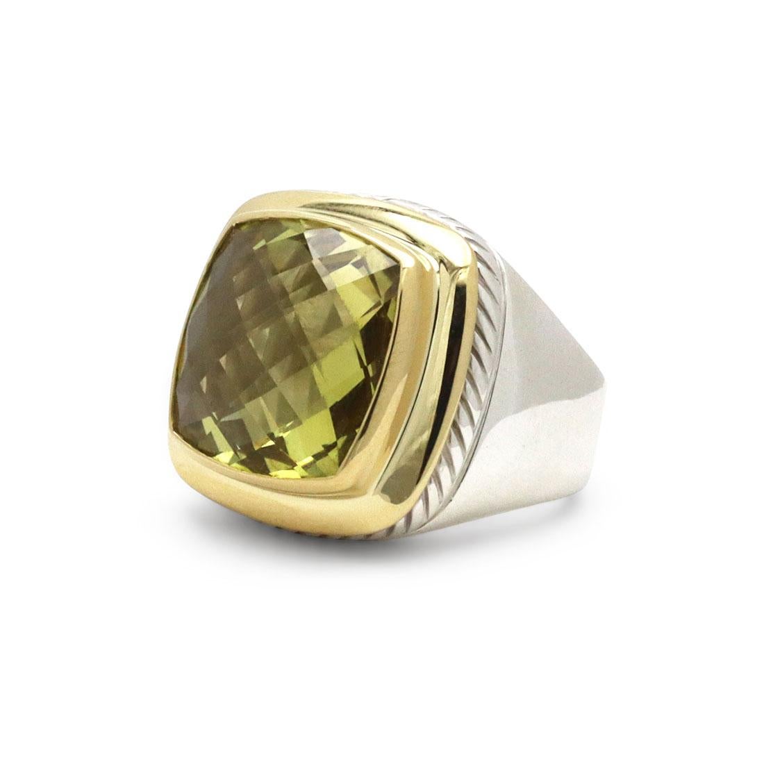 Authentic David Yurman Albion ring crafted in silver and 18 karat yellow gold centering on a square faceted peridot stone. Signed DY, 750, 925. Ring size 7. Ring is accompanied by the original David Yurman pouch, no box or papers. CIRCA