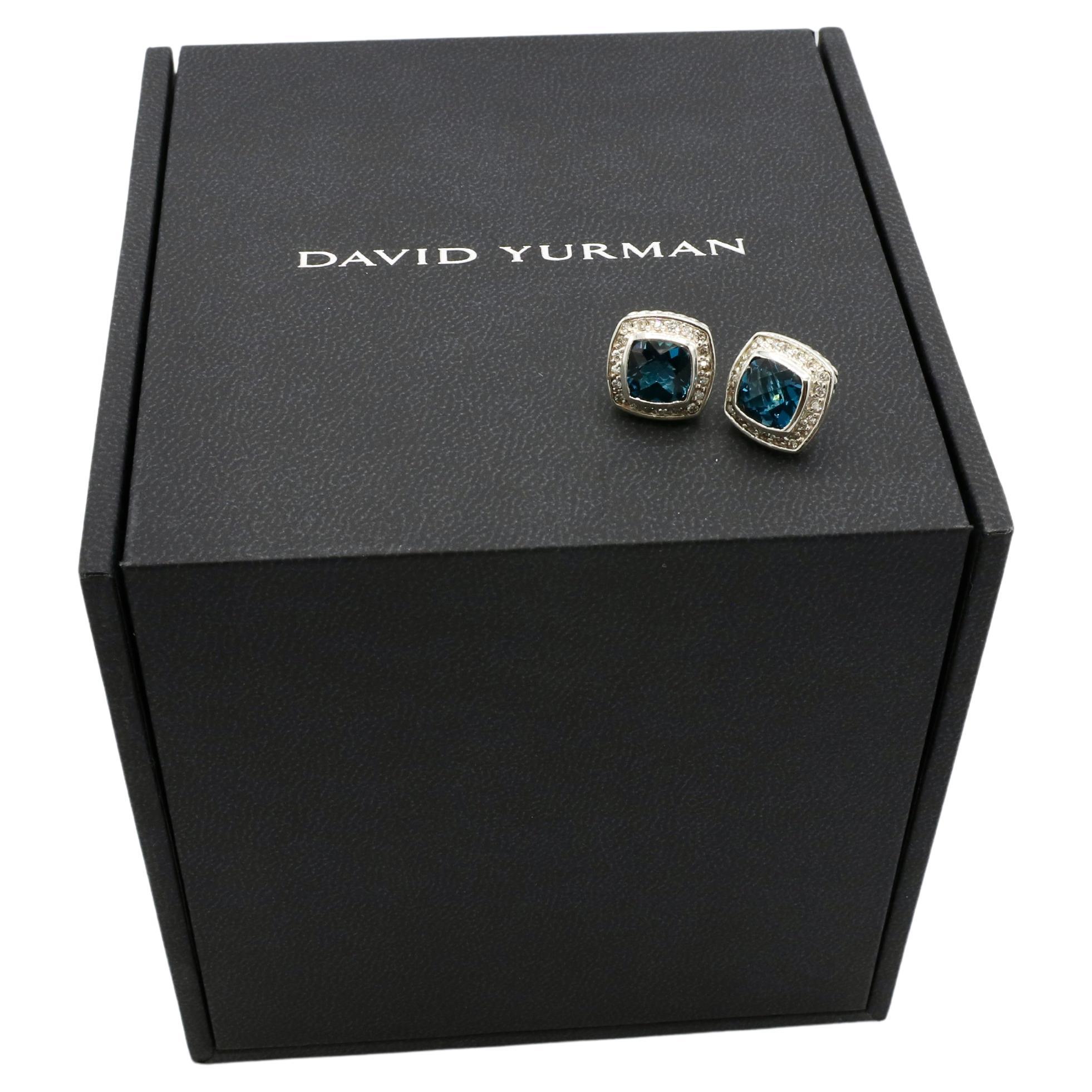 David Yurman Albion Sterling Silver Blue Topaz & Natural Diamond Stud Earrings 
Metal: Sterling silver 
Weight: 6.04 grams
Topaz: Blue, 7mm
Diamonds: Pavé-set natural diamonds, 0.25 CTW G-H VS
Diameter: 11.5mm
Signed: ©D.Y. 925
Backs: Push