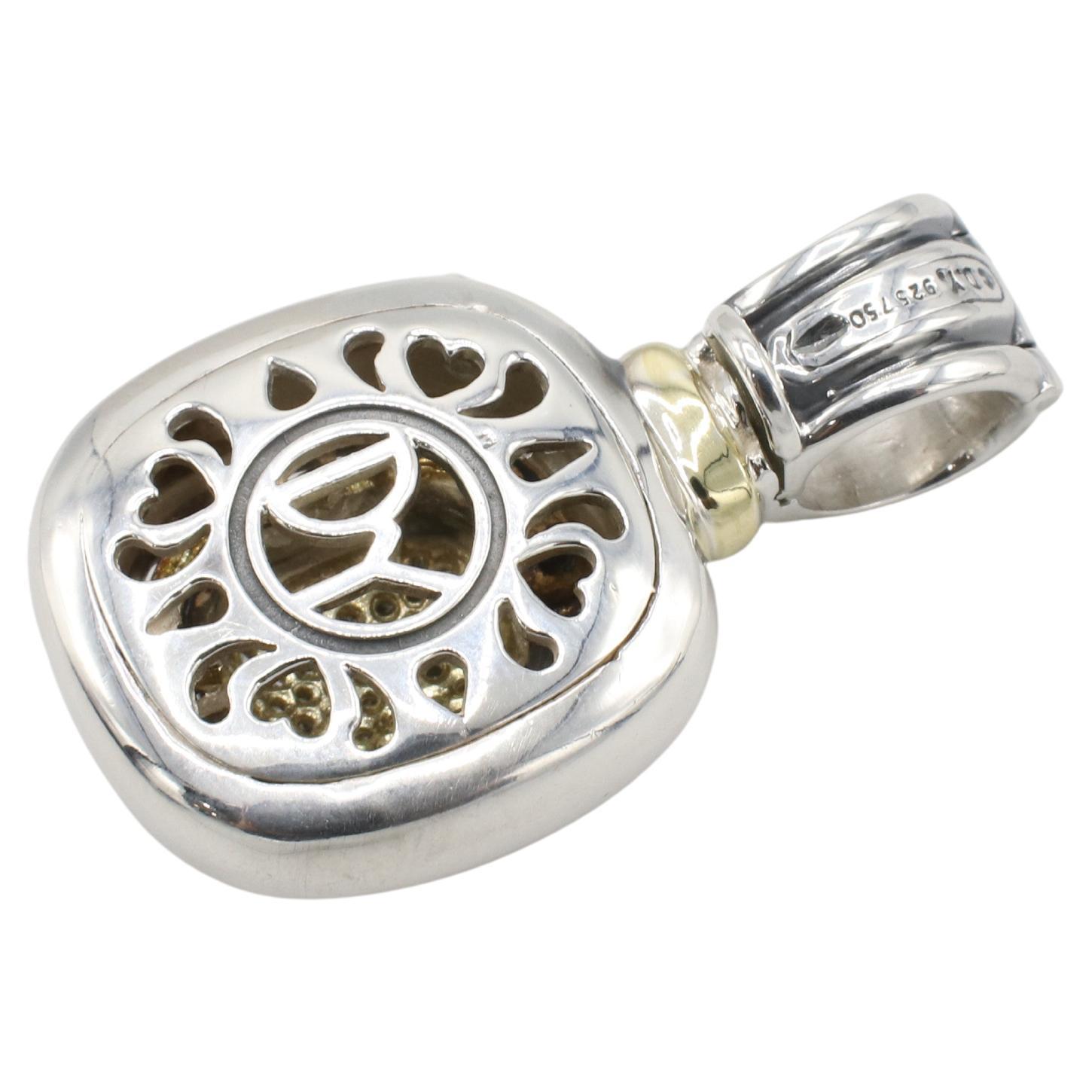 David Yurman Albion Sterling Silver & Gold Pavé Natural Diamond Enhancer Pendant
Metal: Sterling silver & 18k yellow gold
Weight: 19.9 grams
Length: 40mm
Width: 24mm
Diamonds: Approx. .50 CTW round natural diamonds G-H VS
Signed: ©D.Y. 925 750
Bale