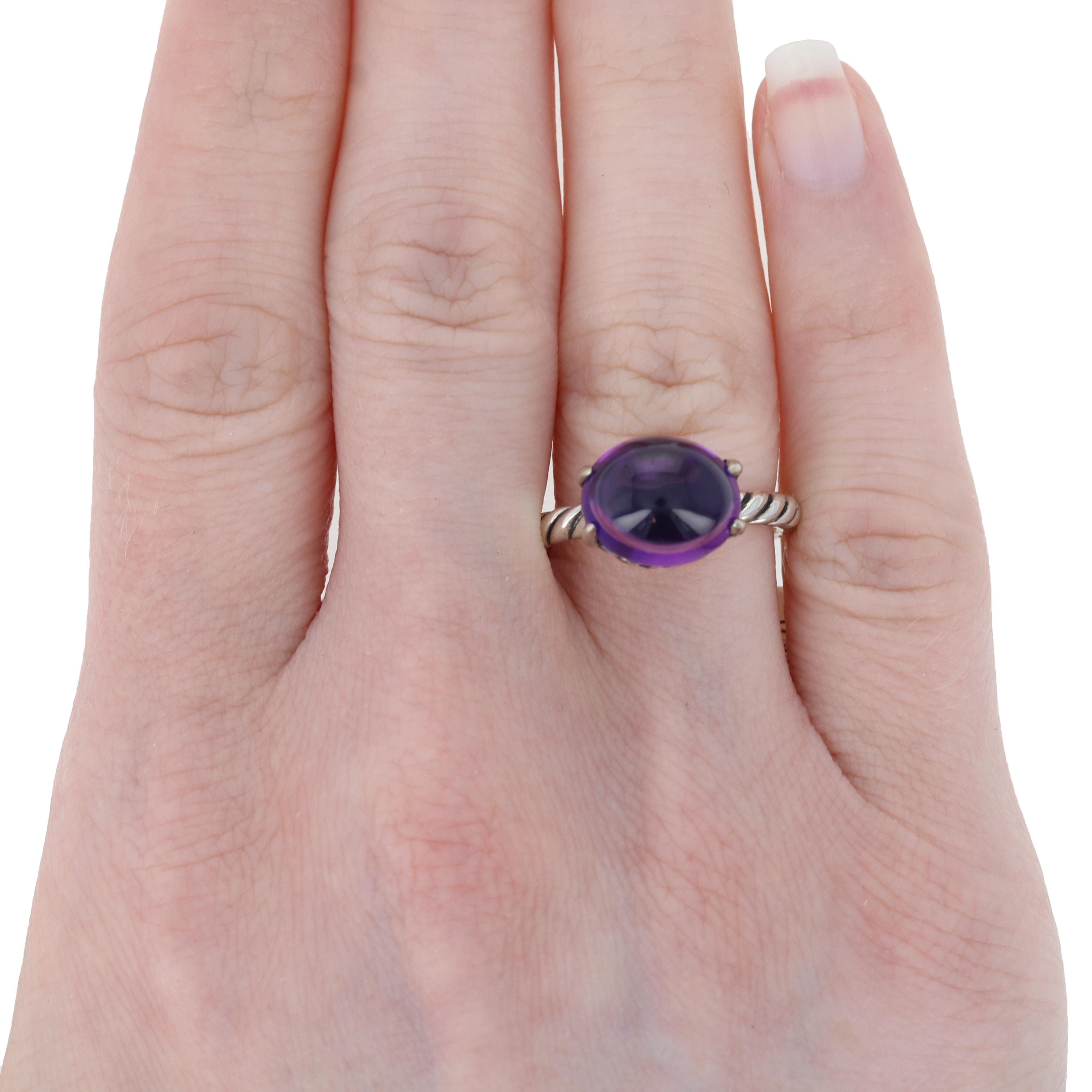 Give your favorite ensembles a touch of designer glamour when you pair them with these fabulous ring! Designed by David Yurman in sterling silver, this Color Classics ring features an amethyst cabochon. The royal-purple amethyst measures a