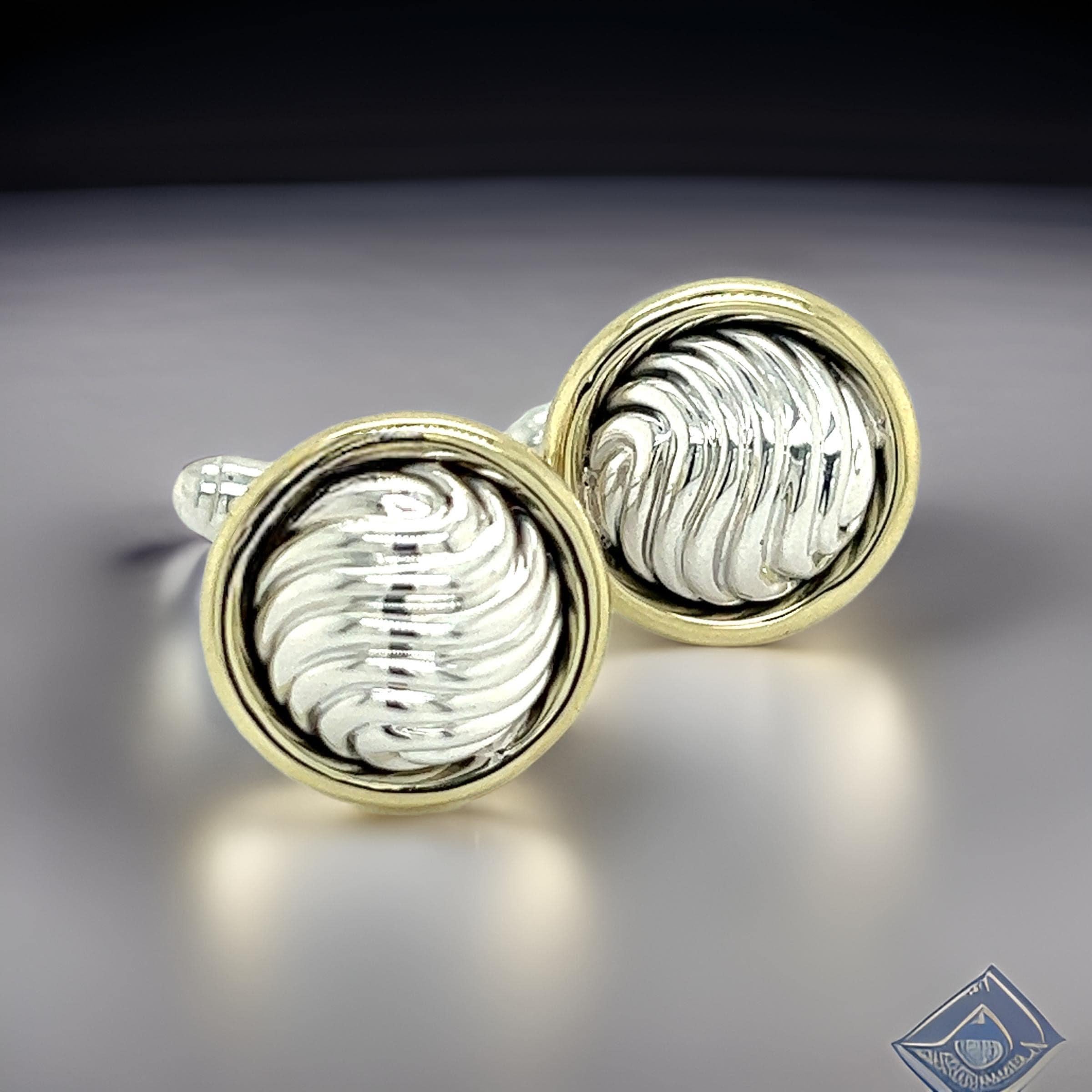 Authentic David Yurman Estate Cufflinks Sterling Silver + 14k Gold DY495

Retail: $999.00

These David Yurman Sterling Silver and 14k Yellow Gold Trim Men’s Cufflinks blend classic luxury with contemporary design.

Crafted from sterling silver, they