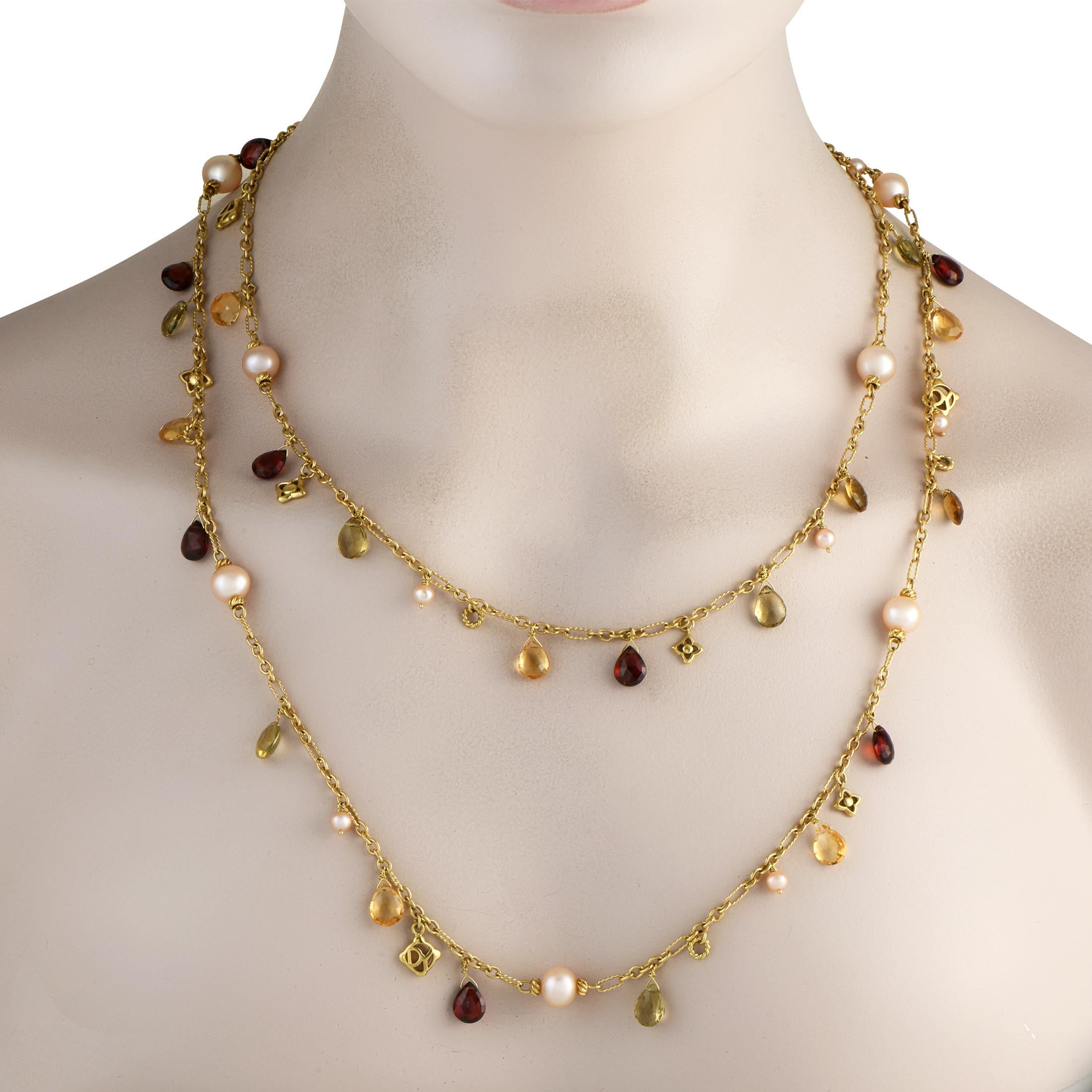 Add drama to any ensemble with this David Yurman Bijoux necklace. An eclectic mix of Pearls, Garnets, Citrine, and Smokey Quartz gemstones elevate the textured chain. Crafted from 18K Yellow Gold, it measures 47 long so you can easily create a