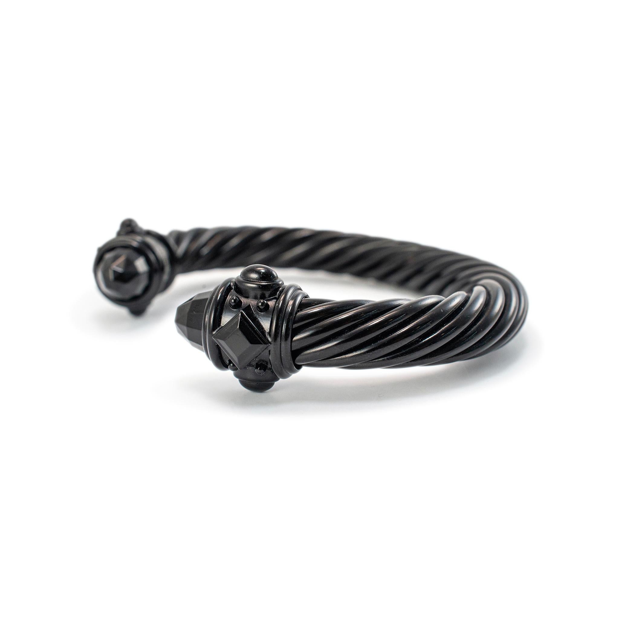 Brand: David Yurman

Gender: Unisex

Metal Type: Black Aluminium 

Length:  6.50 inches 

Width: 10.00 mm

Weight: 32.77 Grams

One designer made cuff bracelet. The metal was tested and determined to be black aluminum. Engraved with 