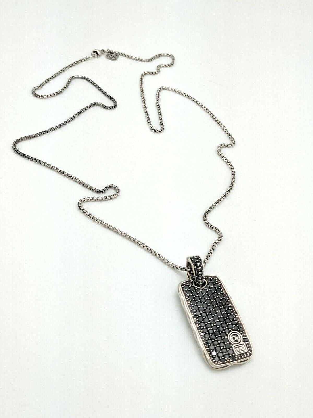 This DY necklace features a Black Diamond dog tag in sterling silver with chevron design for a bold & confident look. This necklace is a rare find by DY!
The box chain is 26