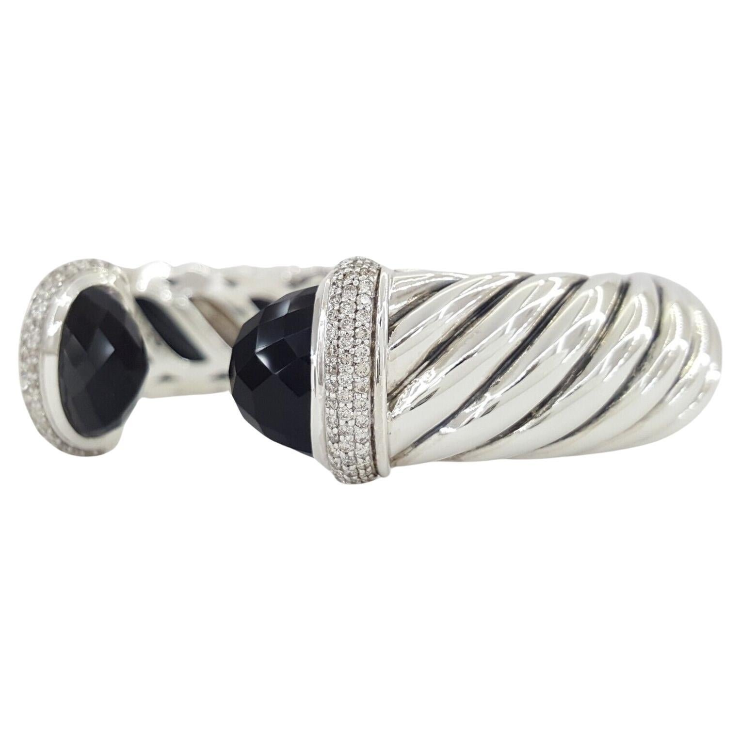 David Yurman Black Onyx & 3/4 ct Round Diamonds 15 mm Cuff Sterling Silver Bangle Bracelet  / Bracelet Size S. 

The bracelet weighs 41.5 grams, Small Size. This fits 6-6.25