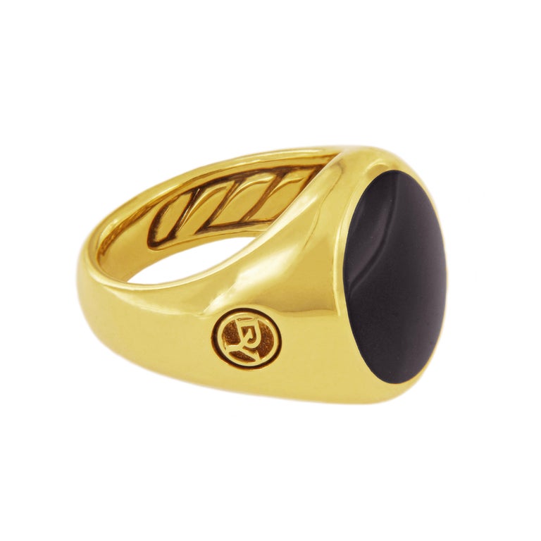 -Material: 18k Yellow Gold
-Ring size: 9
-Black Onyx: 11x14mm
-Ring weight: 18.3gr
-Ring width: 4.8-16mm

*Includes David Yurman Box.