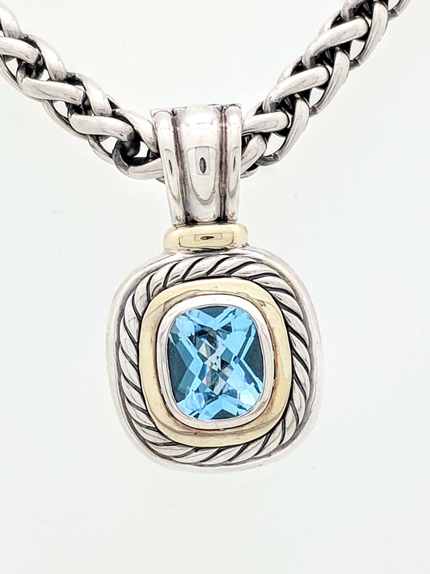 David Yurman Two Tone Blue Topaz Albion Pendant & Necklace

You are viewing an Authentic David Yurman Blue Topaz Albion Pendant Enhancer on DY Wheat Necklace featured in Two Tone, Sterling Silver & 14k yellow gold. This blue topaz enhancer pendant