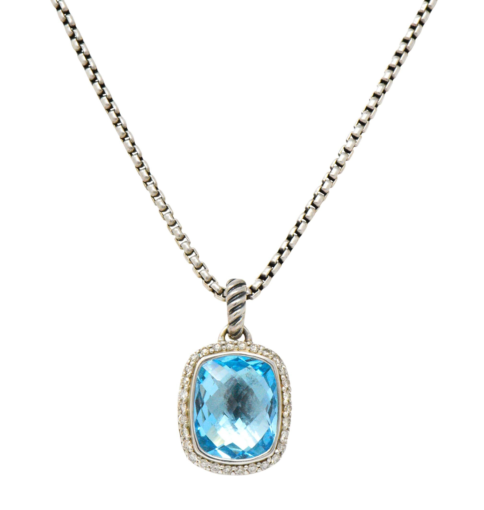 Featuring a bright blue faceted topaz bezel set in sterling silver

0.30 CTW of bright white and clean (32) diamonds

Cable link chain necklace with lobster claw clasp

Total Weight: 10.9 Grams

Measures: 16