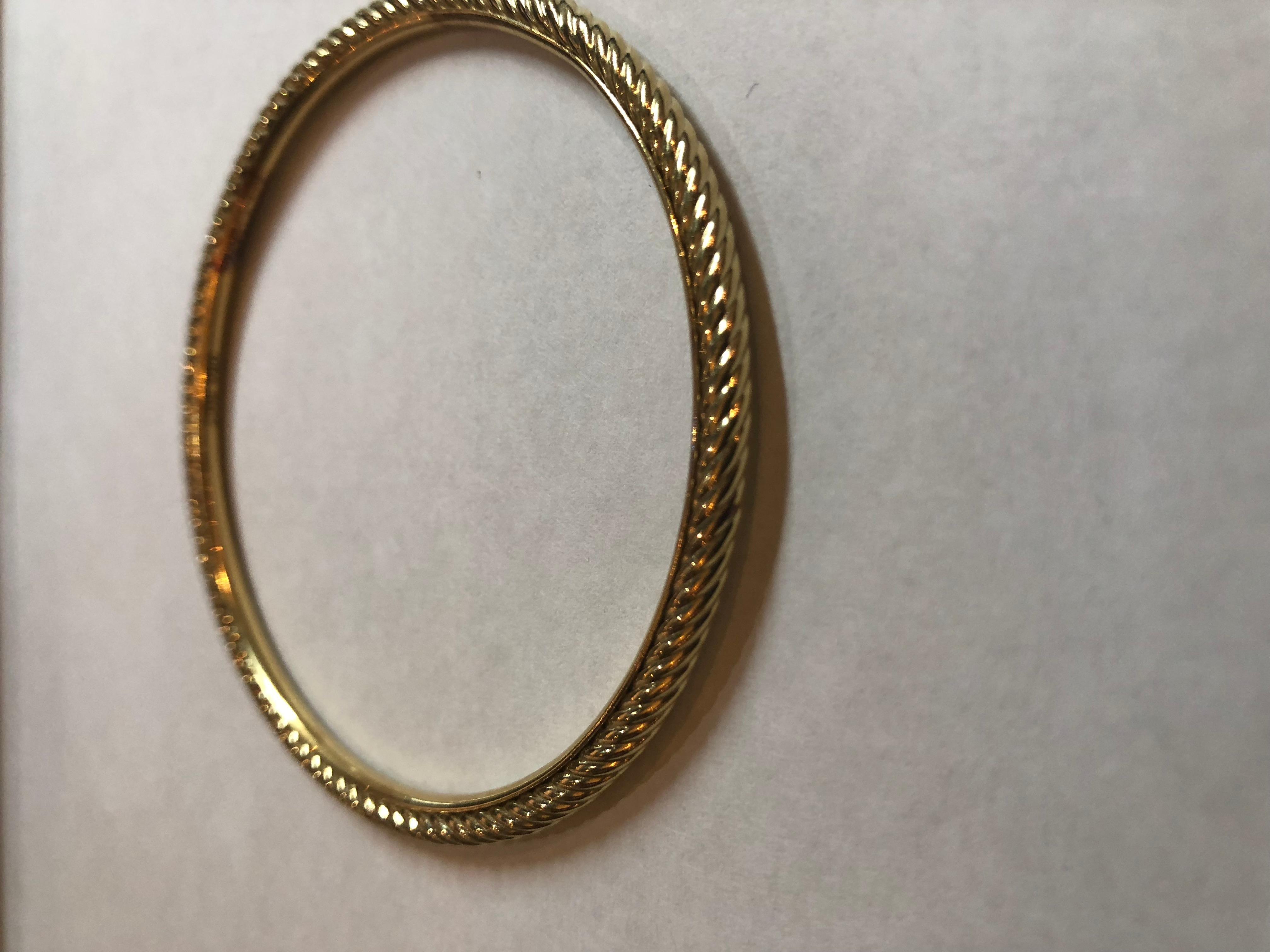 David Yurman Cable and Smooth 18k Gold Thin Bangle Bracelet
10.7 Grams 18k Gold
Signature DY 750