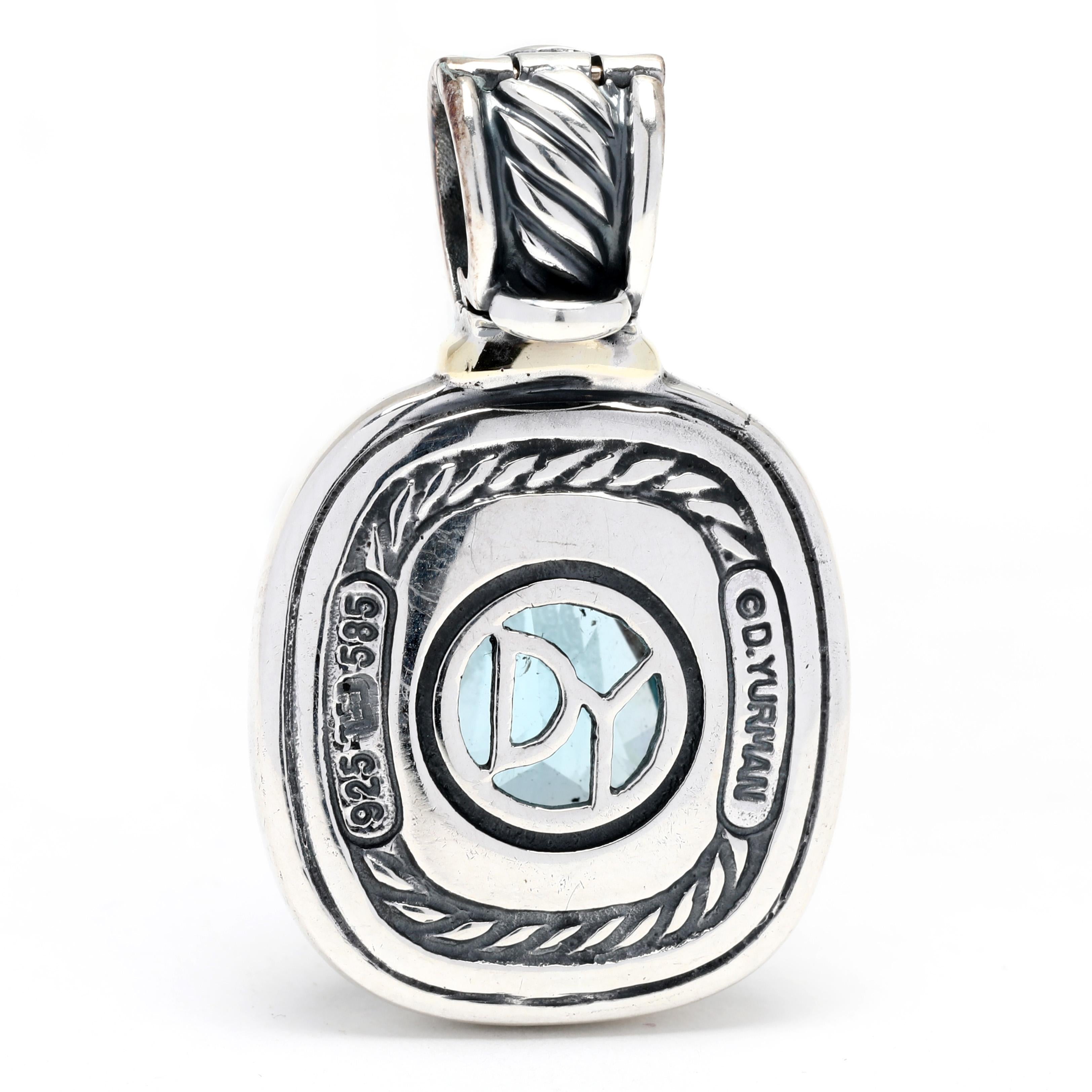 This stunning David Yurman Cable Classics Large Blue Topaz Enhancer is crafted in luxurious 14K yellow gold and sterling silver. This beautiful enhancer has a length of 1 1/8 inches and features a sparkling blue topaz gemstone. Perfect for any