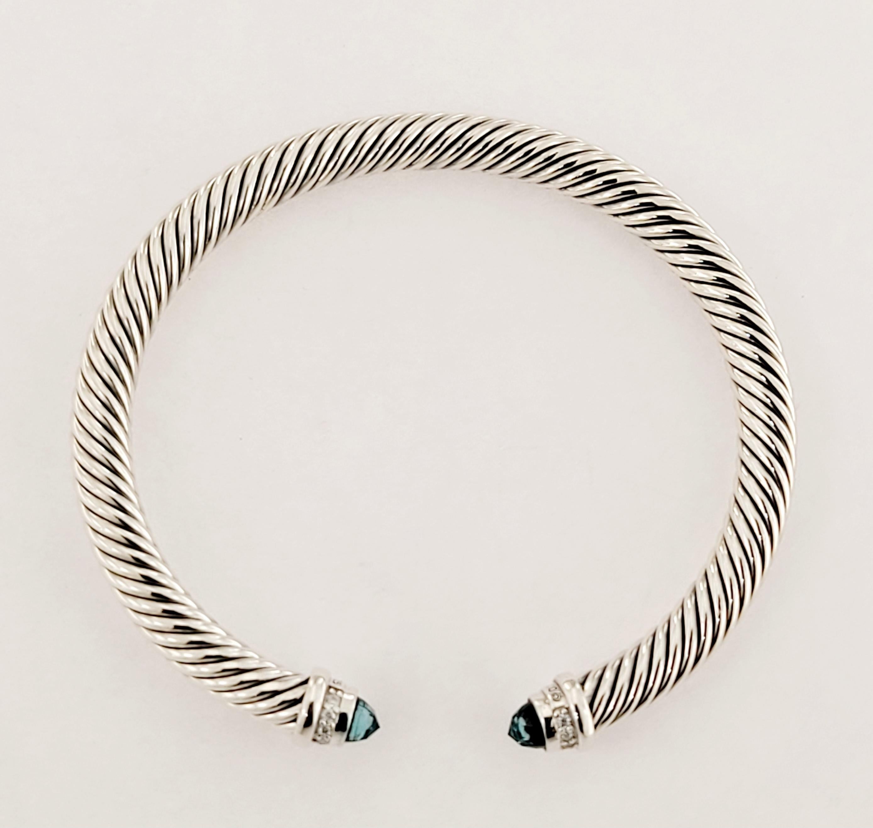 Brand David Yurman
Condition Never worn
Size small 
Gender Women
Material Sterling silver
 Hampton Topaz and  diamonds
Bracelet 5mm
Weight 24.6gr
Retail price $695
Comes with David Yurman pouch