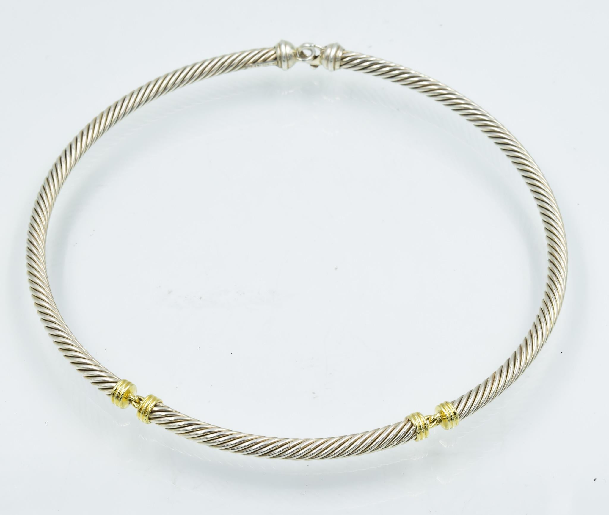 This David Yurman choker necklace is a simple yet elegant silver and 14k gold piece.  