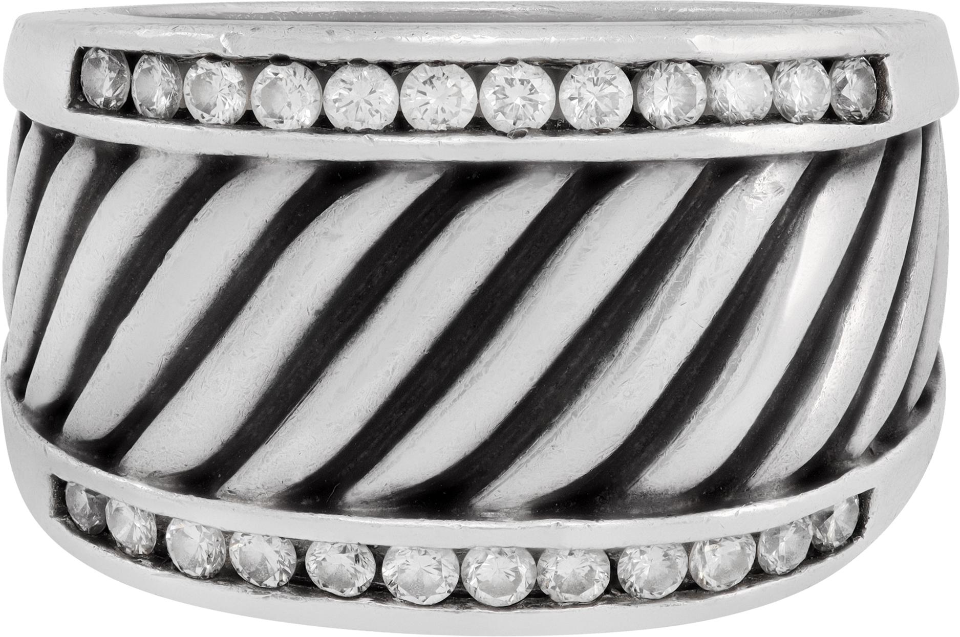 David Yurman Cable Cigar ring in stering silver with 0.72 carats in F-G color, VVS clarity diamonds. Size 7.25

This David Yurman ring is currently size 7.25 and some items can be sized up or down, please ask! It weighs 6.6 pennyweights and is