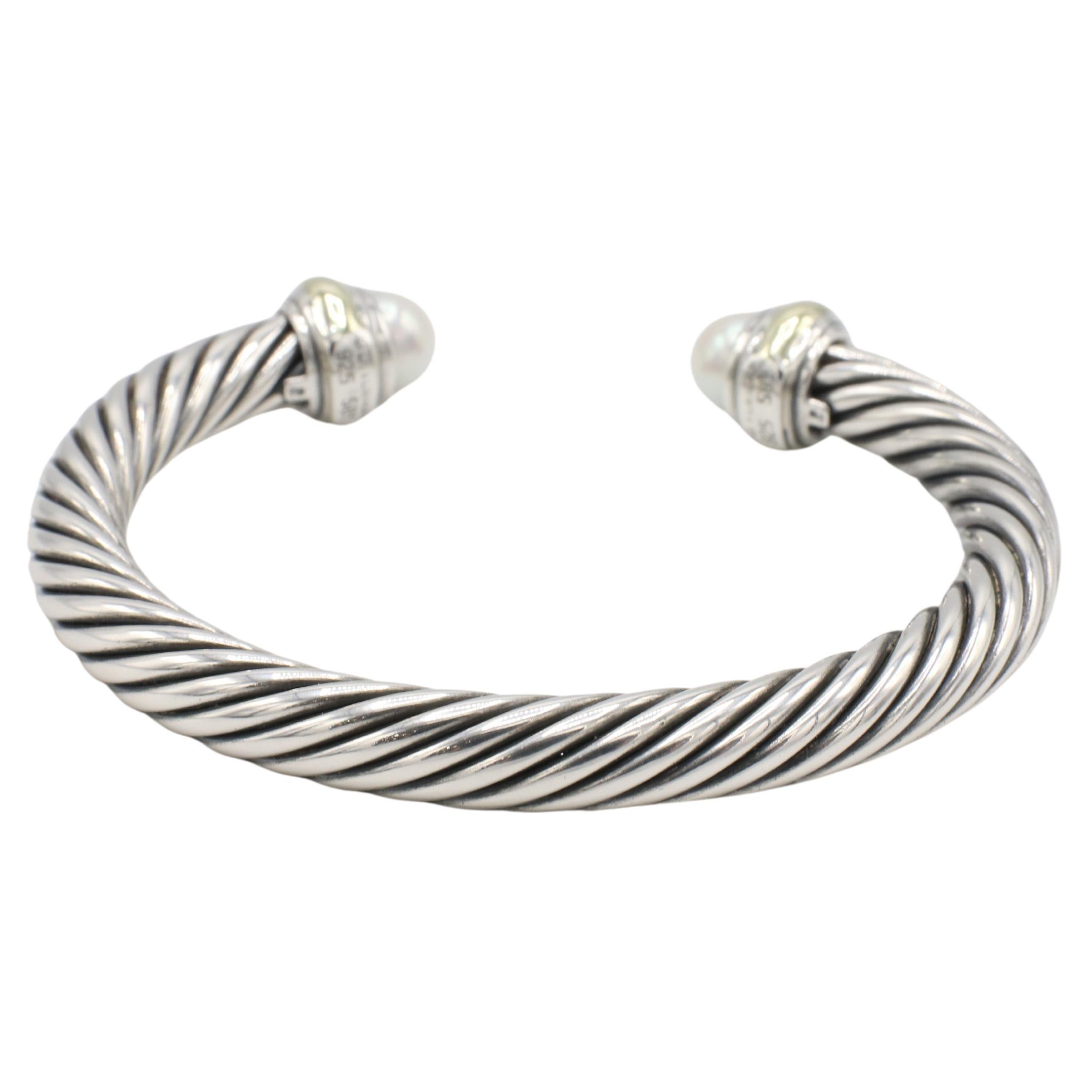 David Yurman Cable Classic Sterling Silver & Gold Pearl Bangle Bracelet Cuff 7MM
Metal: Sterling silver & 14k yellow gold
Weight: 41.5 grams
Width: 7mm
Size: Fits up to a 6.25 inch wrist
Signed: ©D. YURMAN 925 585
Retail: $895 USD