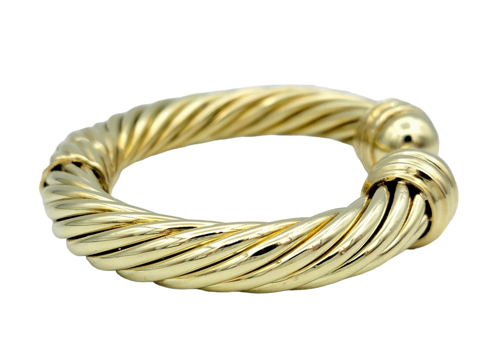 Contemporary David Yurman Cable Classics 10 mm Hinged Cuff Bracelet in 14 Karat Yellow Gold For Sale