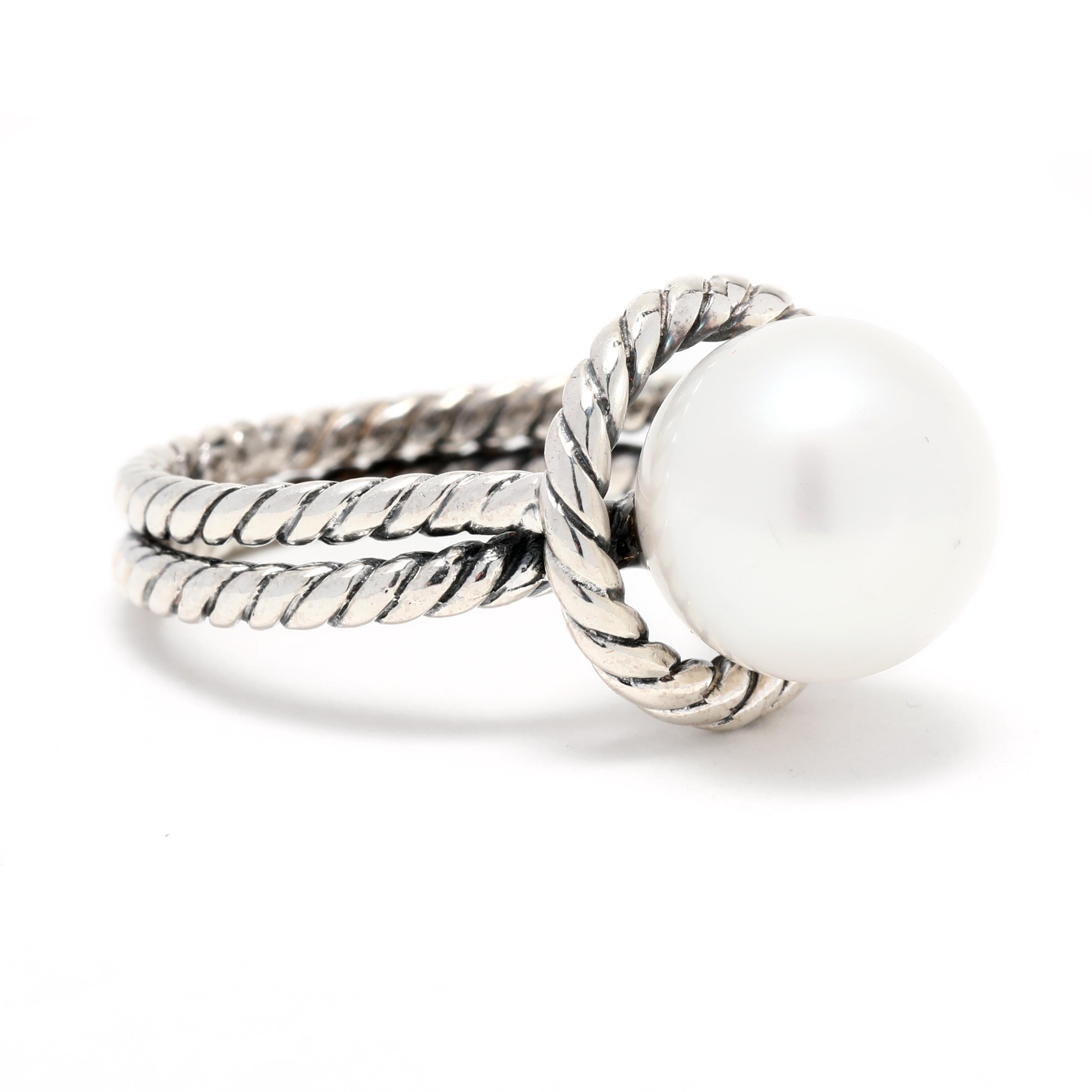 This classic David Yurman Cable Classics Pearl Cocktail Ring is the perfect way to add a touch of sophistication to any outfit. Crafted from sterling silver with a ring size 5.75, this simple yet elegant ring features a large round pearl that is