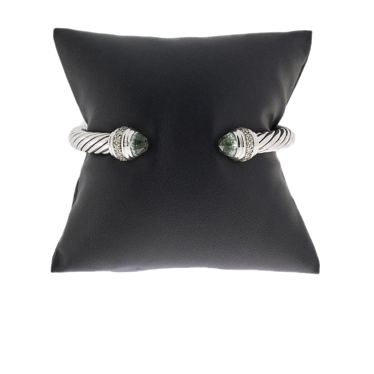 Item Details:
Estimated Retail - $1,825.00
Brand - David Yurman
Metal - 925 Sterling Silver
Total Carat Weight (TCW) - 0.48 ctw (Diamonds only)
Style - Cuff Bracelet
Width - 7.00 mm
Colored Stone Color - Green

Stone 1 Information:
Stone Type -