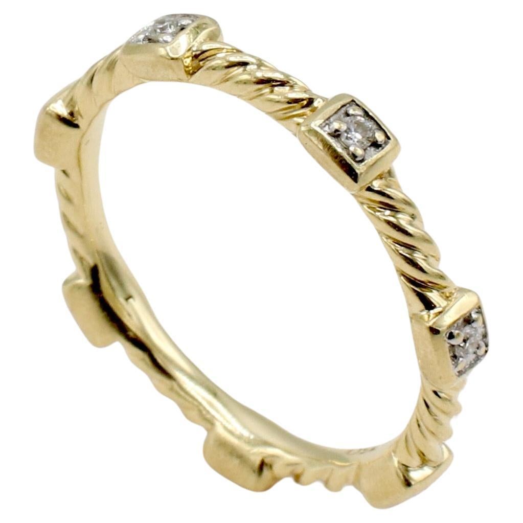 David Yurman Cable Collectibles 18 Karat Yellow Gold & Diamonds Band Stack Ring 
Metal: 18k yellow gold
Weight: 2.86 grams
Diamonds: Approx. .06 CTW round G-H VS natural diamonds
Width: 2mm
Size: 5.5 (US)
Signed: ©D.Y 750
Retail: $850 USD