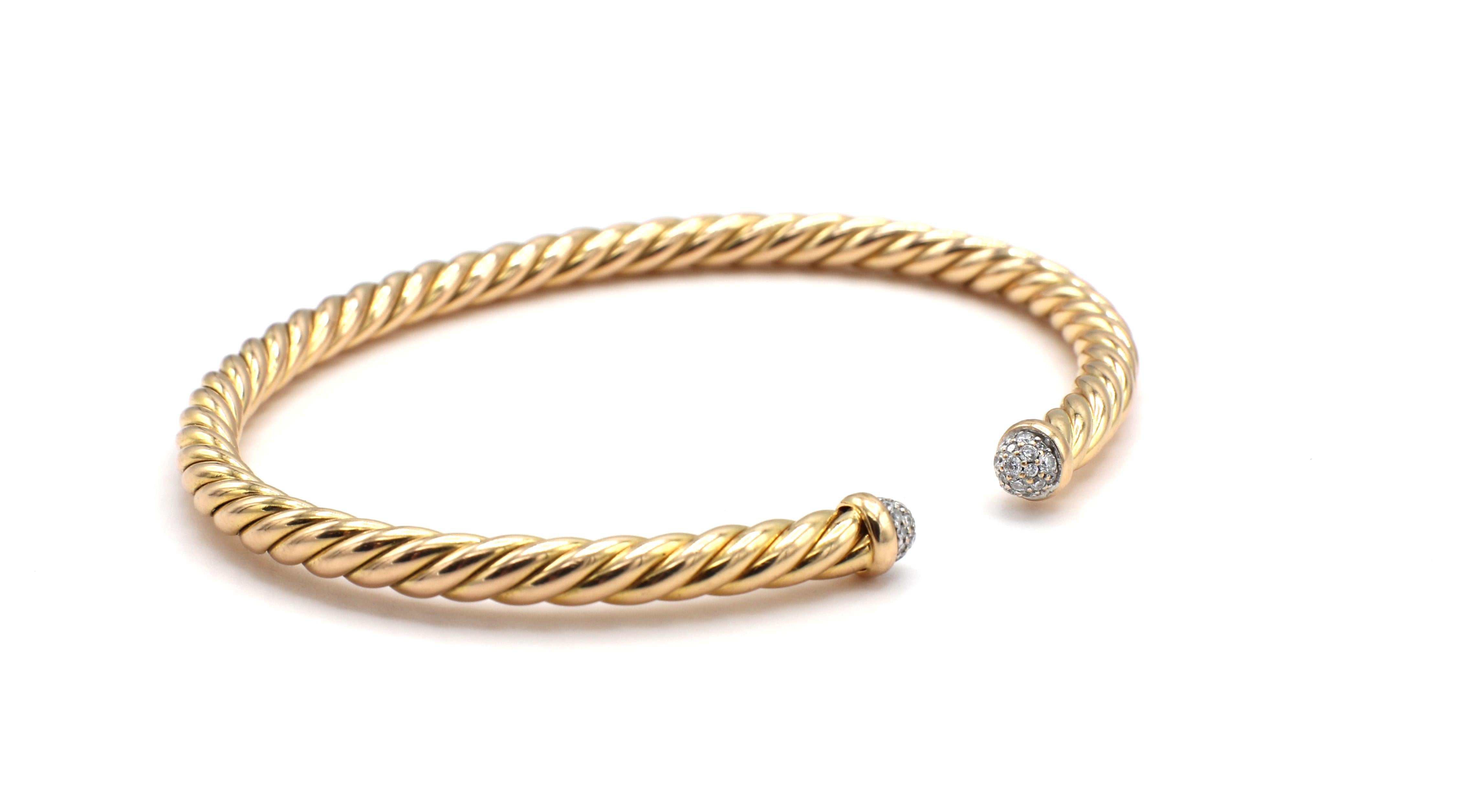 David Yurman Cable Collection Spira Diamond 18K Rose Gold Bracelet 4mm
Metal: 18k rose/pink gold
Weight: 8.06 grams
Diamonds: Approx. .19 CTW G VS
Width: 4MM
Signed: D.Y. 750
Retail: $2,500 USD