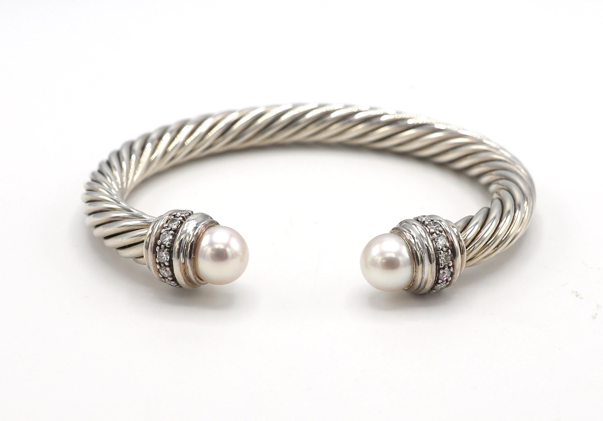 David Yurman Cable Sterling Silver Pearl & Natural Diamond Bangle Cuff Bracelet 
Metal: Stelring silver
Weight: 44 grams
Width: 7mm
Diamonds: Approx. .40 CTW G VS round natural diamonds
Length: Fits approx. 7