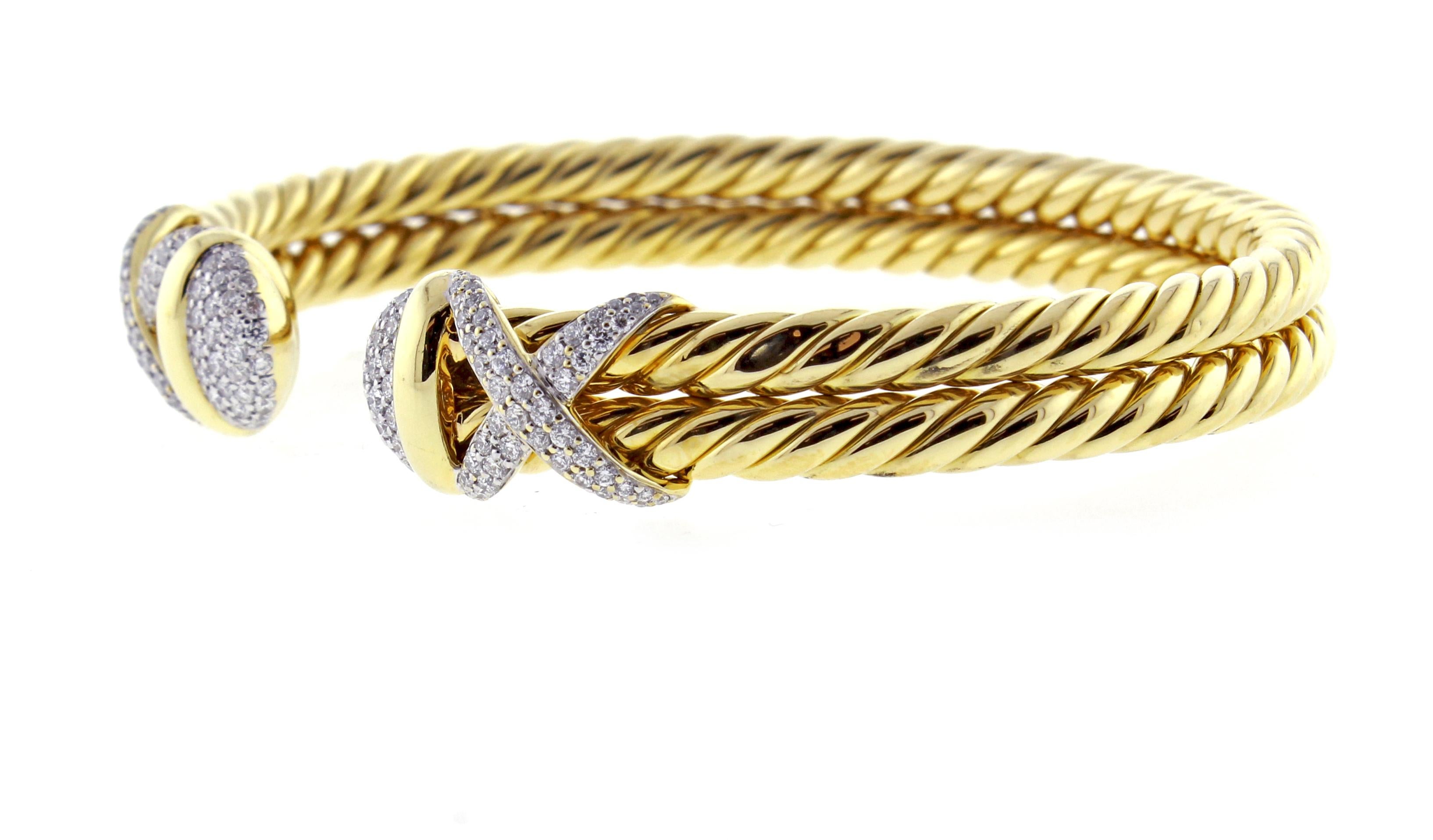 From Davis Yurman's Cable collection, his  double cable wrap bracelet.  The double 18 karat cables are 8mm wide with dazzling pave diamond caps and diamond 