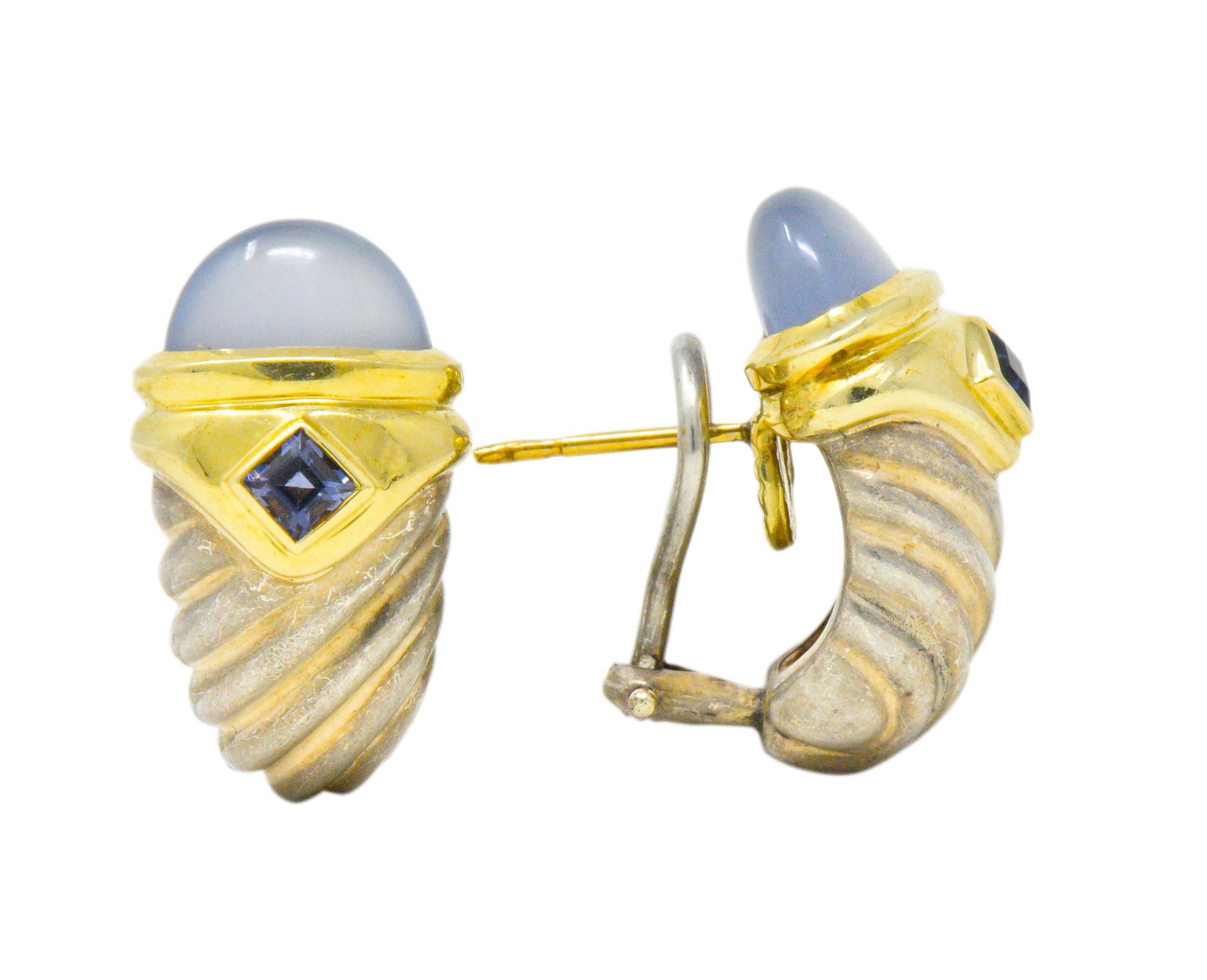 Each featuring milky cabochon chalcedony and iolite bezel set in 14K yellow gold

Shrimp style earrings constructed of twisted sterling silver

Omega backs 

Measures: 22. 37 mm x 12.73 mm

Total Weight: 11.9 Grams

Stamped .925, 585 and D. Yurman