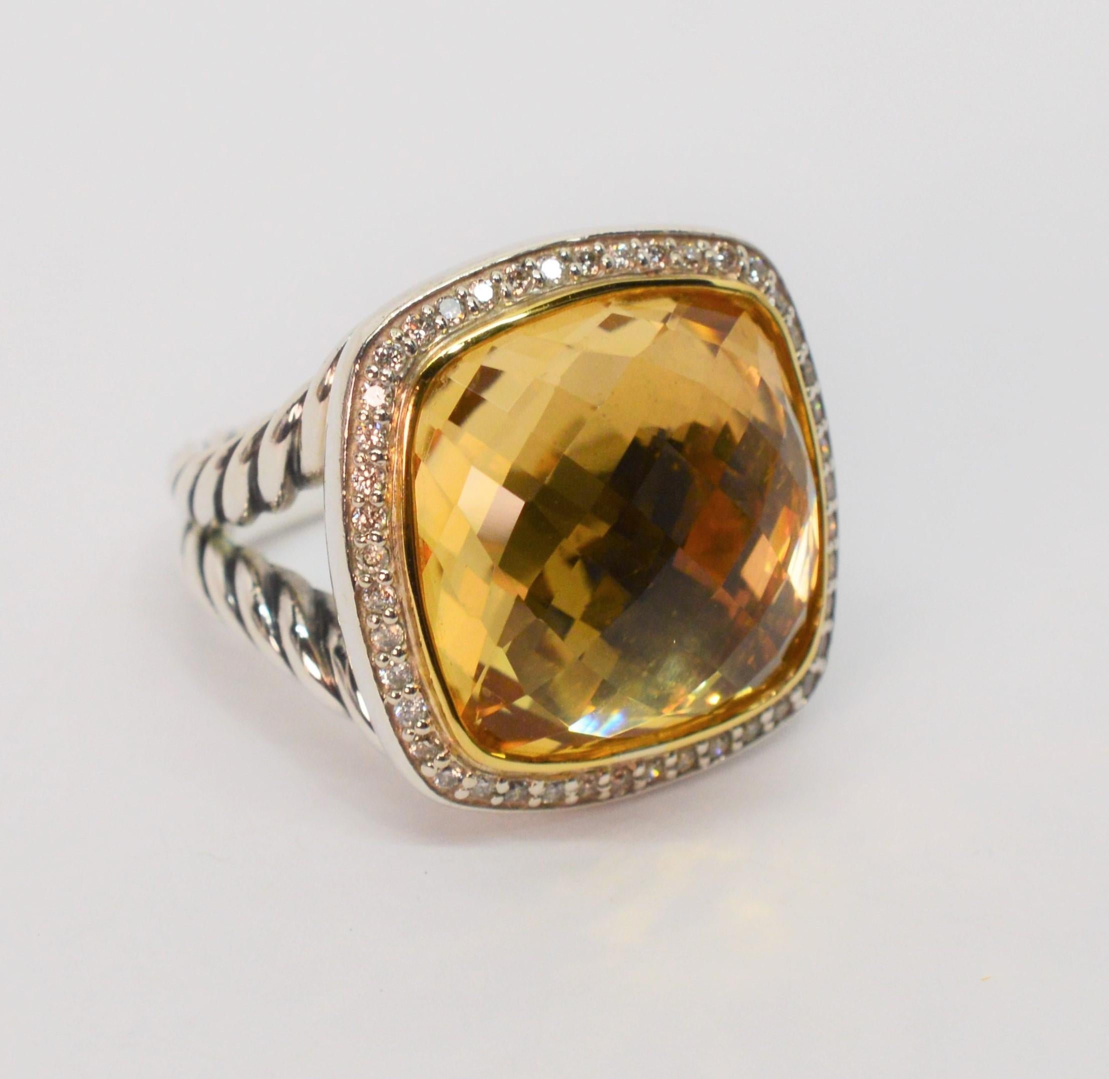 An impressive faceted 17mm cushion cut champagne citrine bezel set in eighteen karat yellow gold 18K is the star of this sterling silver ring by David Yurman. From the Albion Collection, this stunning stone is framed with .33 carat round brilliant