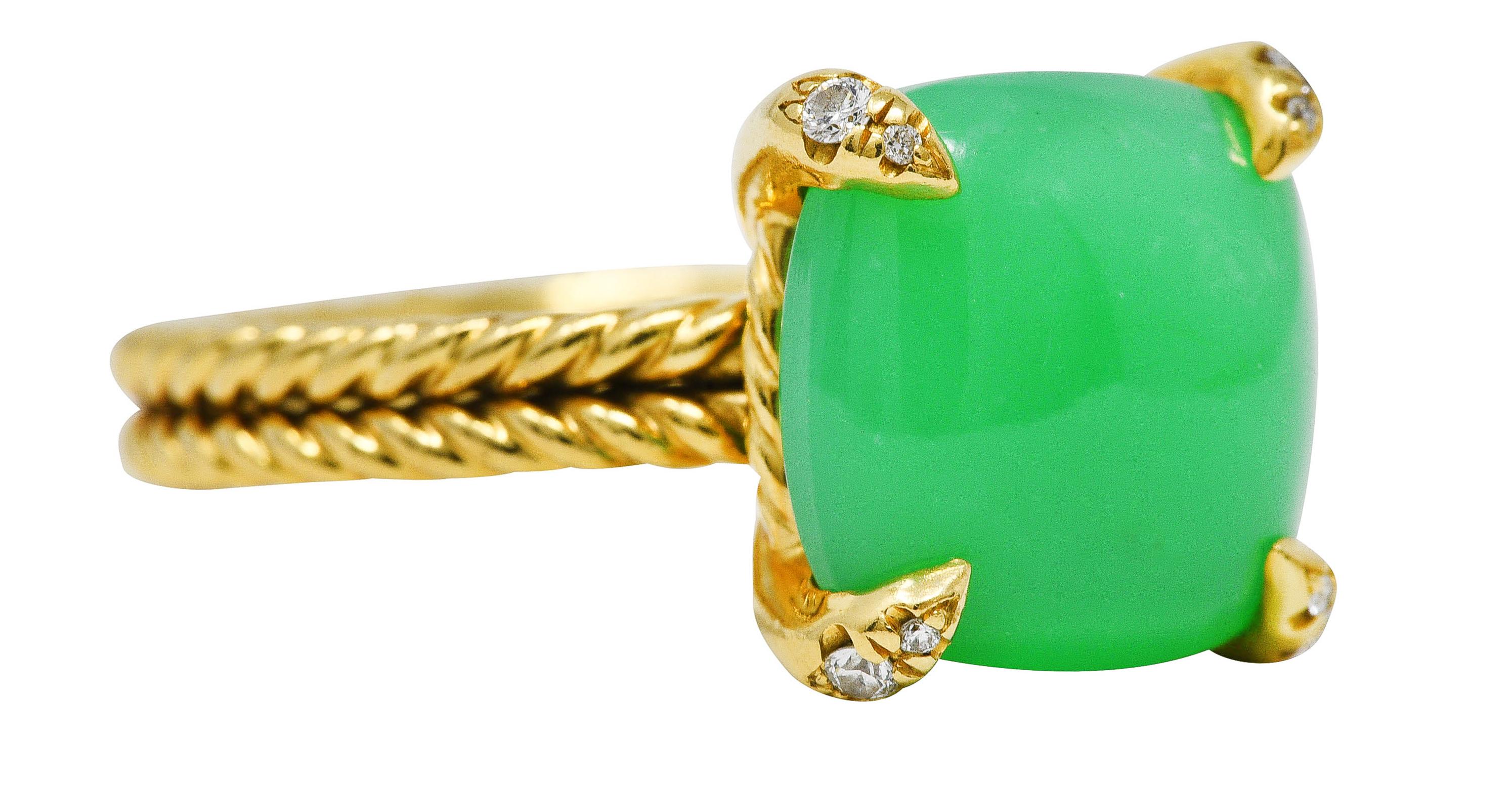 Gold mounting is comprised of Yurman's staple twisted cable motif. Featuring an 11.0 mm cushion shaped double cabochon of chrysoprase chalcedony. Translucent with slightly bluish and strong green color. Claw set with diamond accented prongs. Round