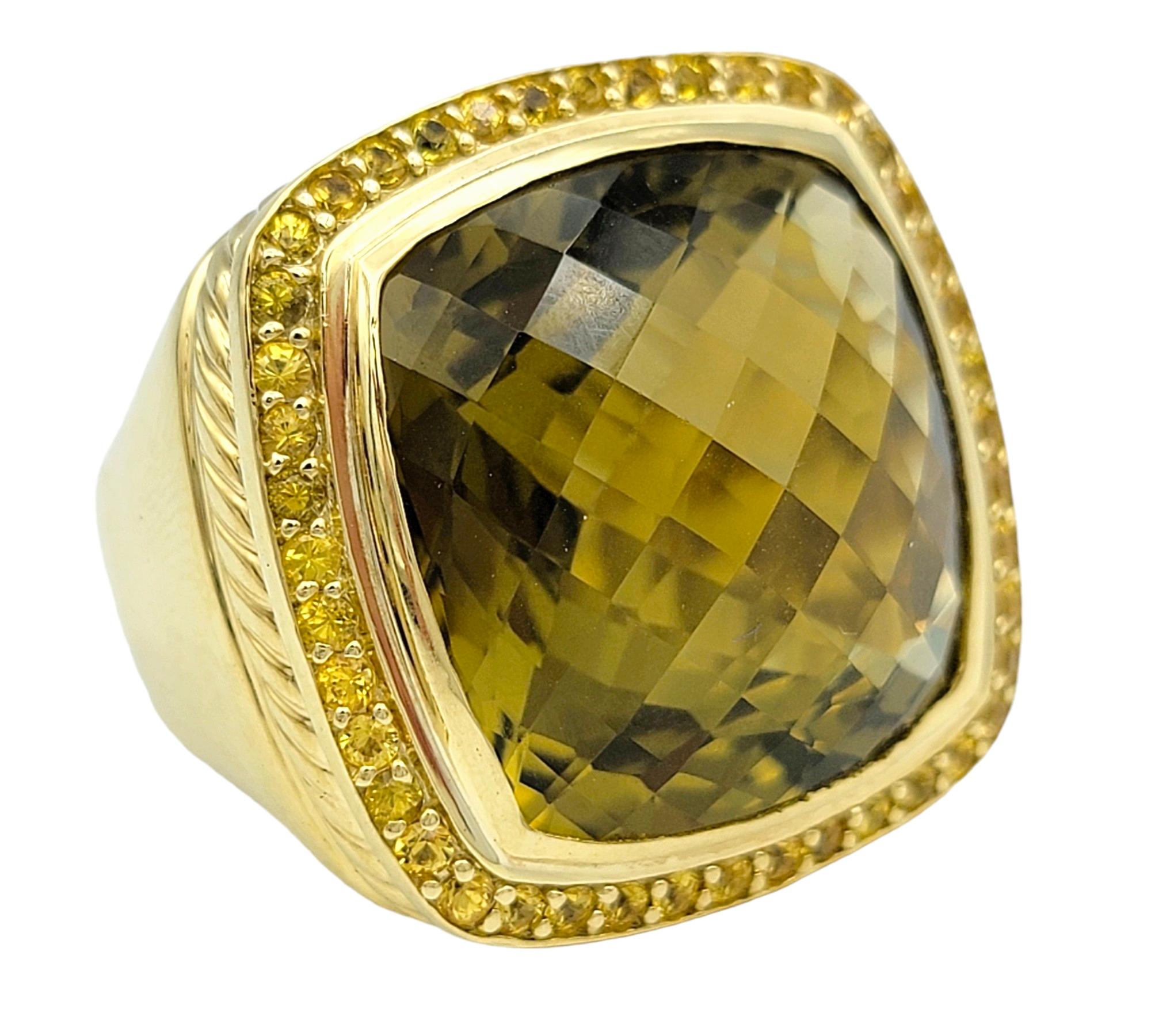 Ring Size: 9

This exquisite David Yurman large cushion citrine Albion ring is a captivating piece of jewelry that exudes elegance and sophistication. Featuring a stunning cushion-cut citrine gemstone as its centerpiece, this ring showcases the warm