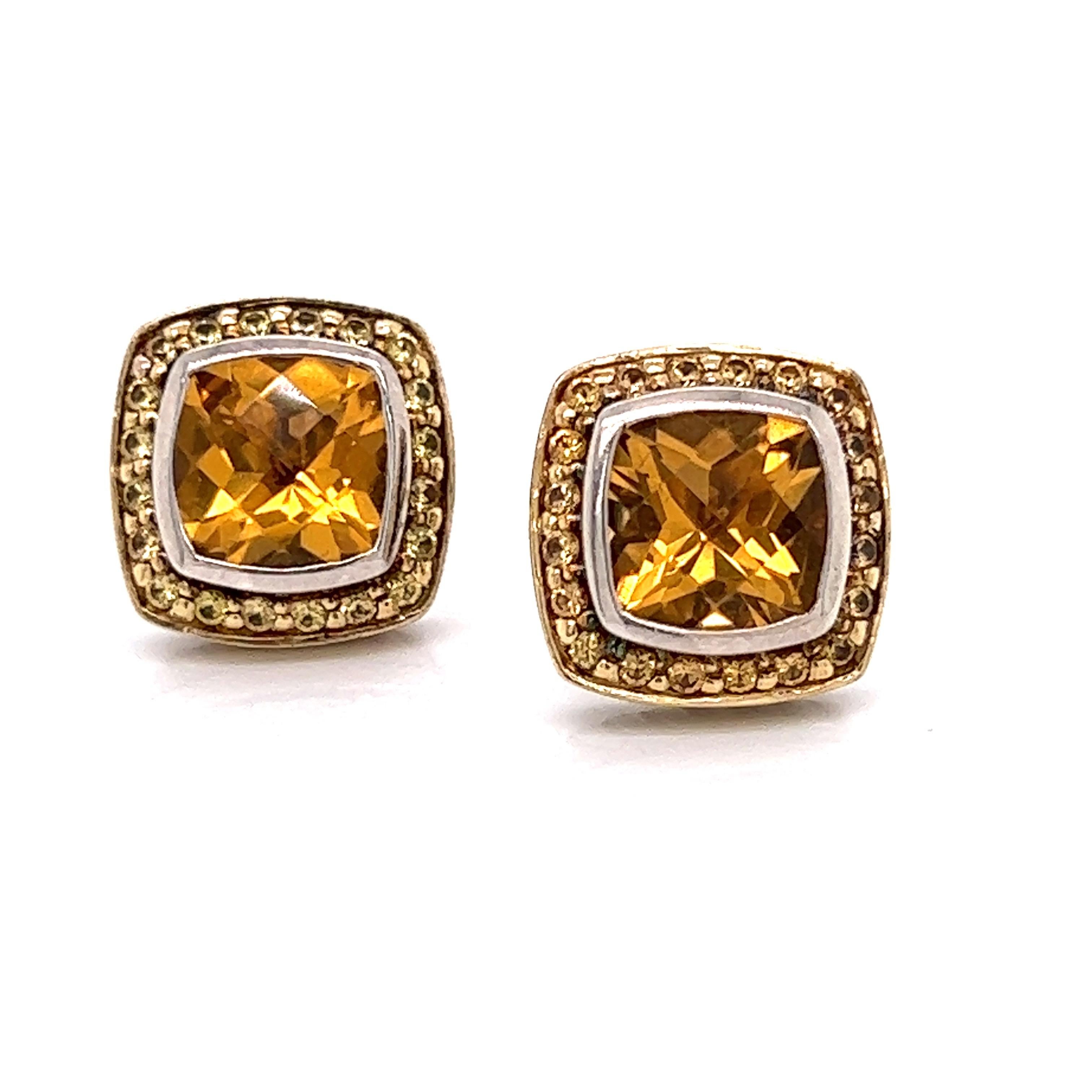 This dazzling pair of David Yurman estate earrings are from the Albion Collection.  In the center is a vibrant seven millimeter cushion cut citrine.  Surrounded by yellow sapphire and mounted in sterling silver and 18 Kt yellow gold.  Dimensions are