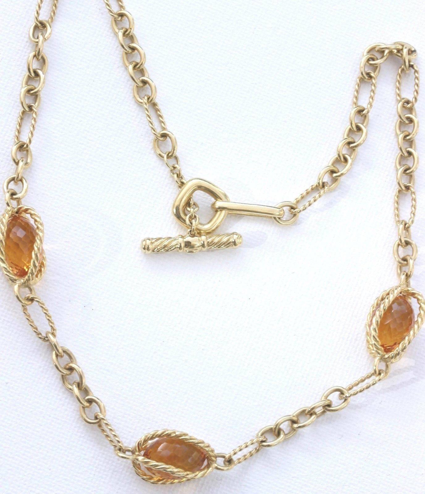 David Yurman 
Style:  Citrine Briolettes Gold Toggle Necklace
Metal:  18K Yellow Gold
Grams:  35 grams
Width:  12.5 MM at widest points
Hallmark: DY 750
Includes:  Elegant Necklace Box

Retail Value:  $5,850 + tax= $6,303.37