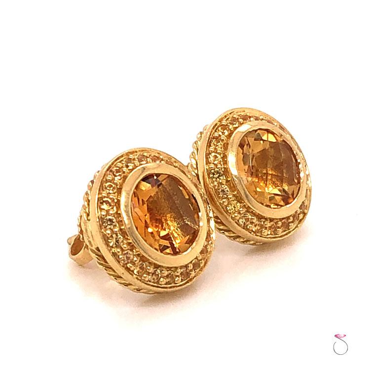 100% Authentic David Yurman Citrine Halo Stud Earrings in 18K yellow. These gorgeous halo studs with checker cut Citrine center are just stunning. The center Citrines are approximately 8mm round, bezel set and have a gorgeous orange yellow tone.