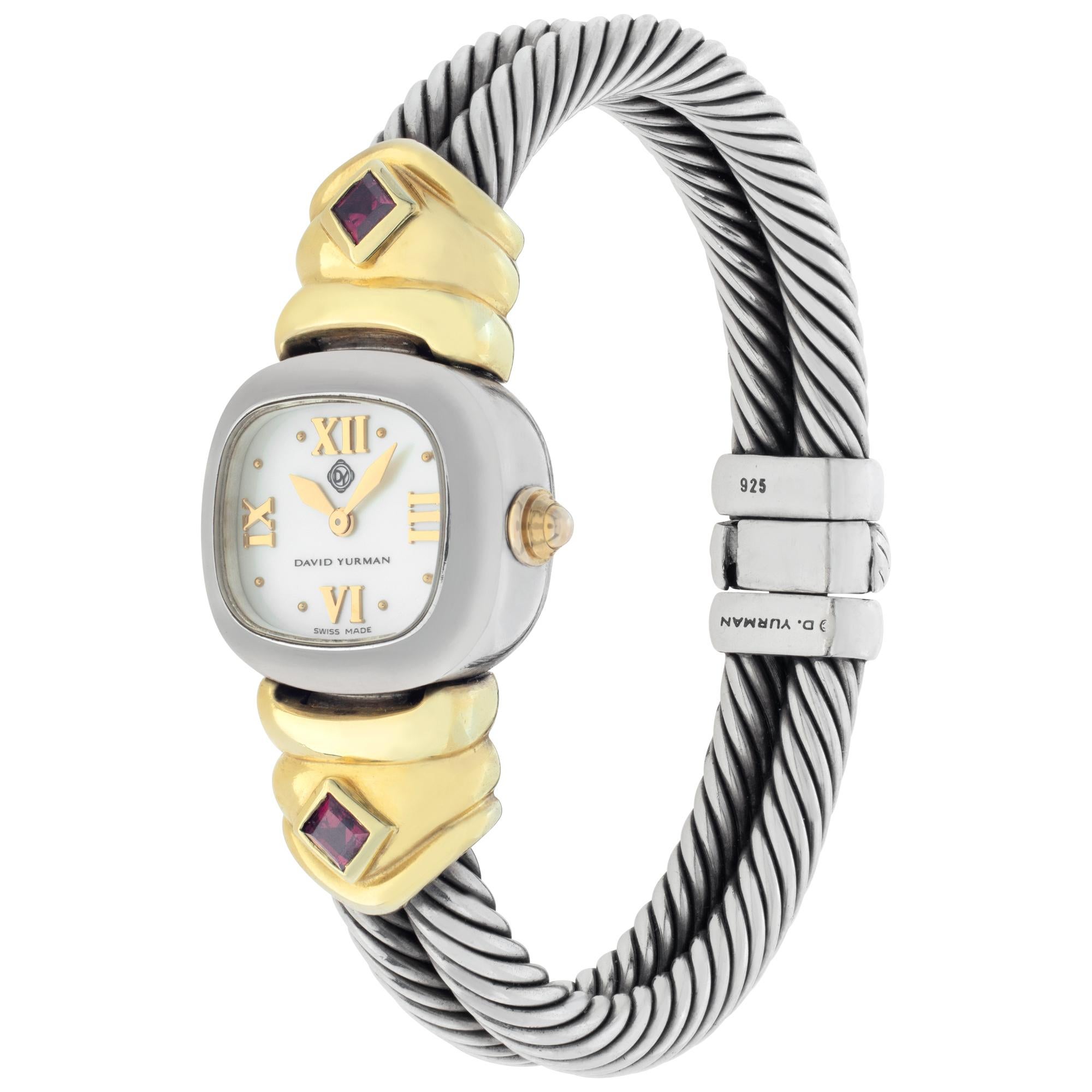 David Yurman Classic Cable watch in 18k & stainless steel with mother of pearl dial and garnet accents. Quartz. 19 mm case size. With box. Fine Pre-owned David Yurman Watch. Certified preowned Dress David Yurman Classic watch is made out of Gold and